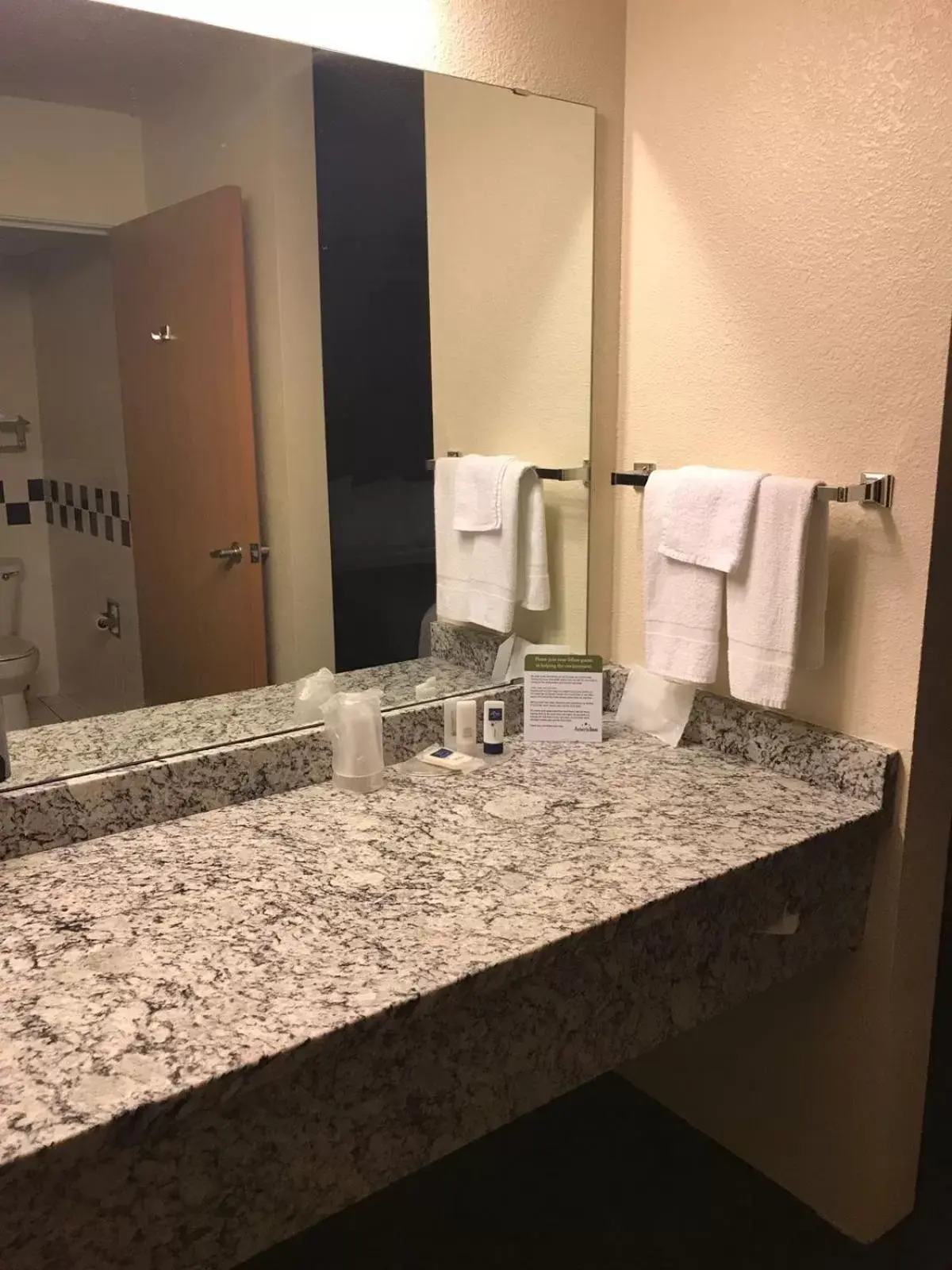 Bathroom in AmericInn by Wyndham Hotel and Suites Long Lake