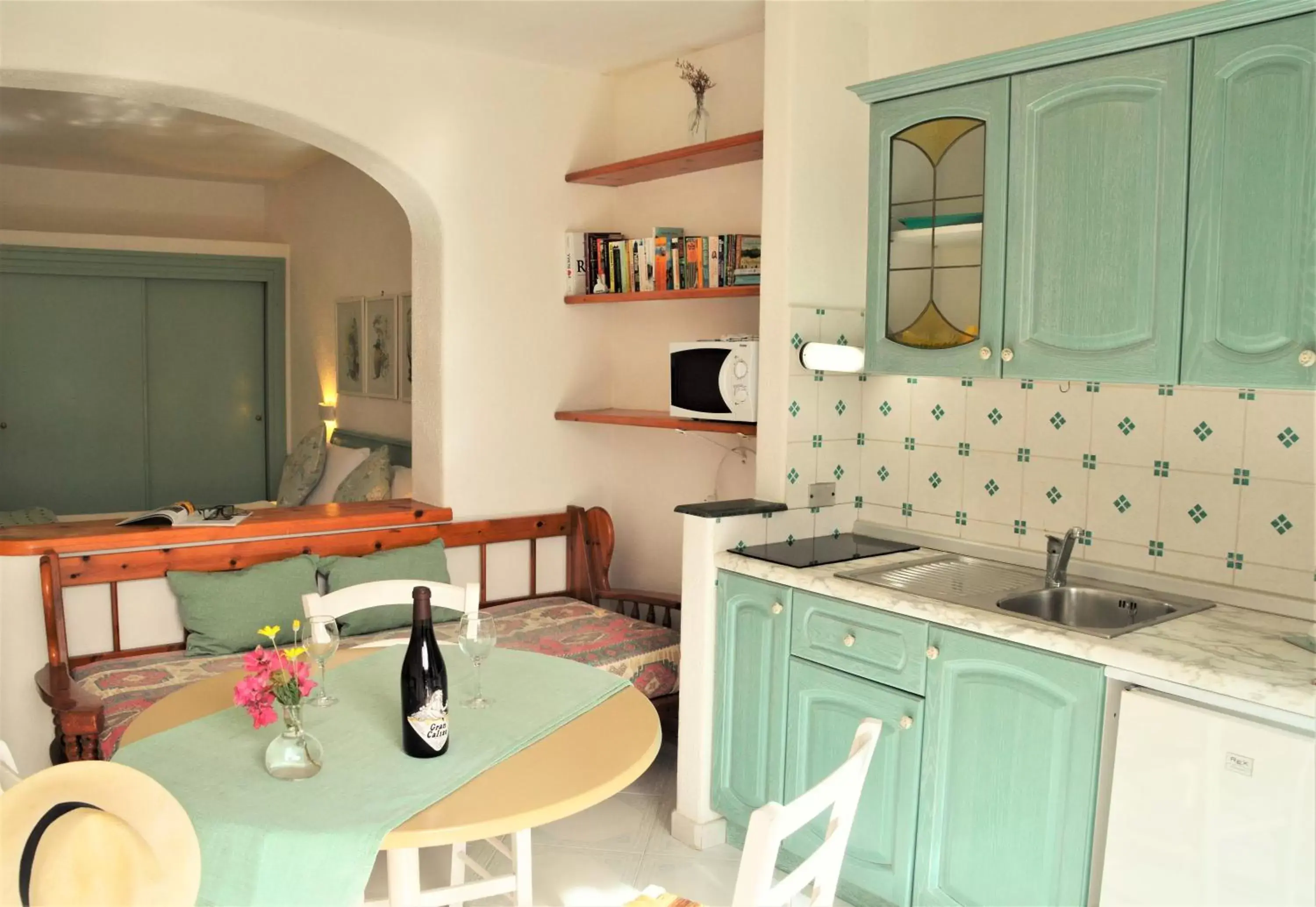 Living room, Kitchen/Kitchenette in Villa Ravino Aparthotel