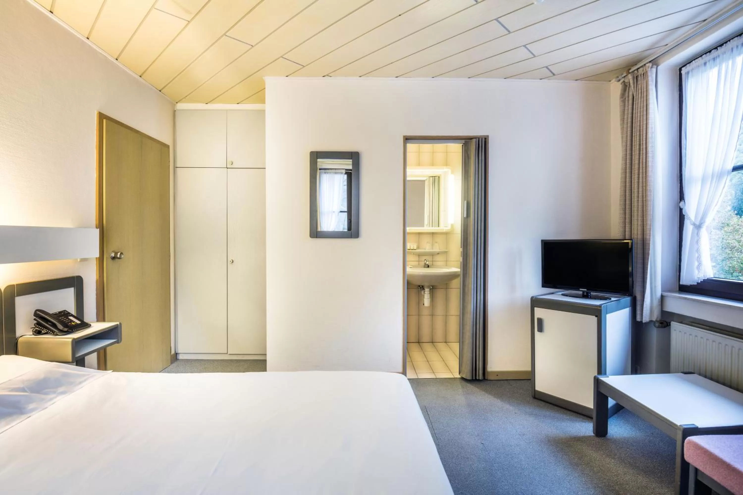 Bed in Hotel Le Postillon