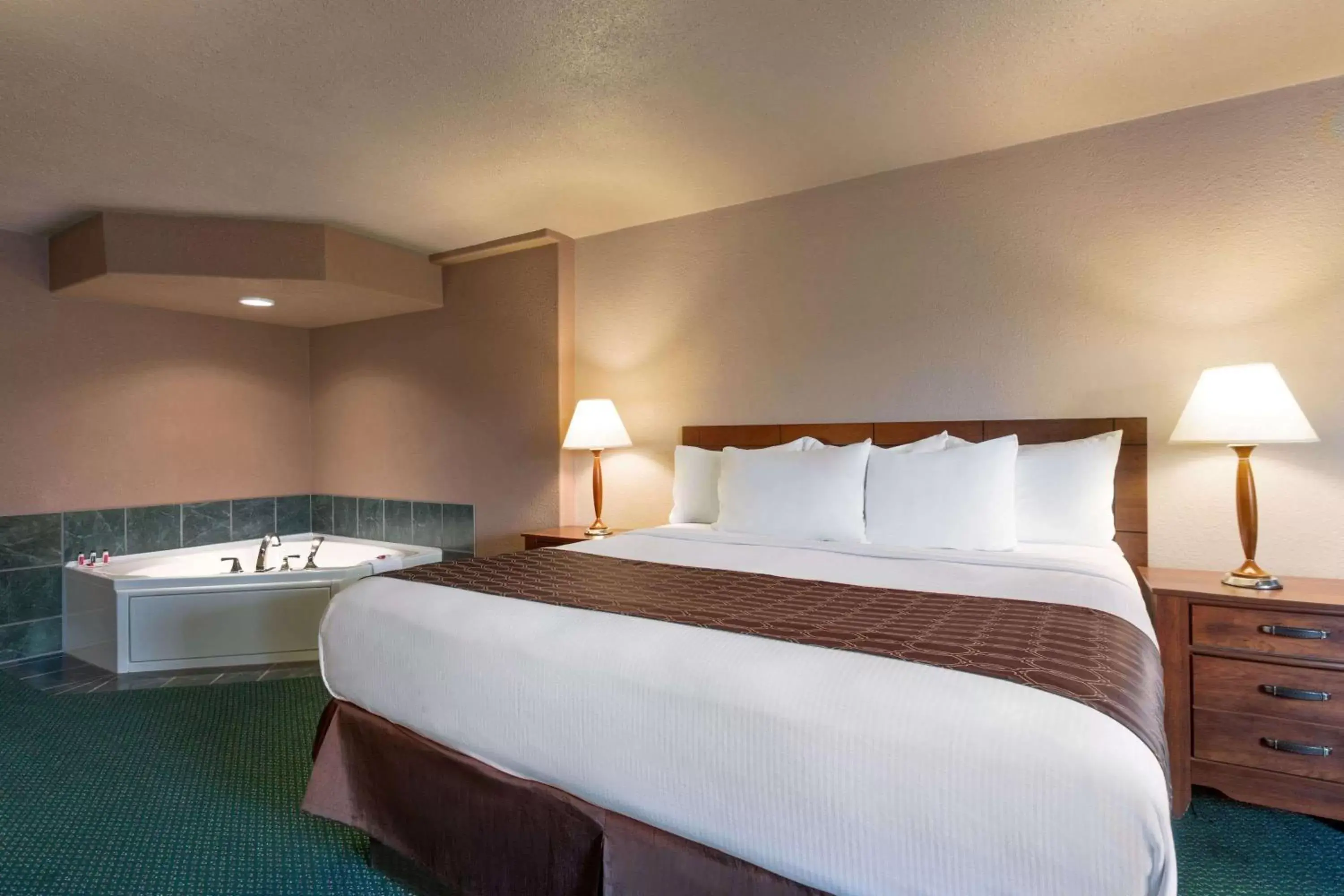 Photo of the whole room, Bed in Ramada by Wyndham Bismarck