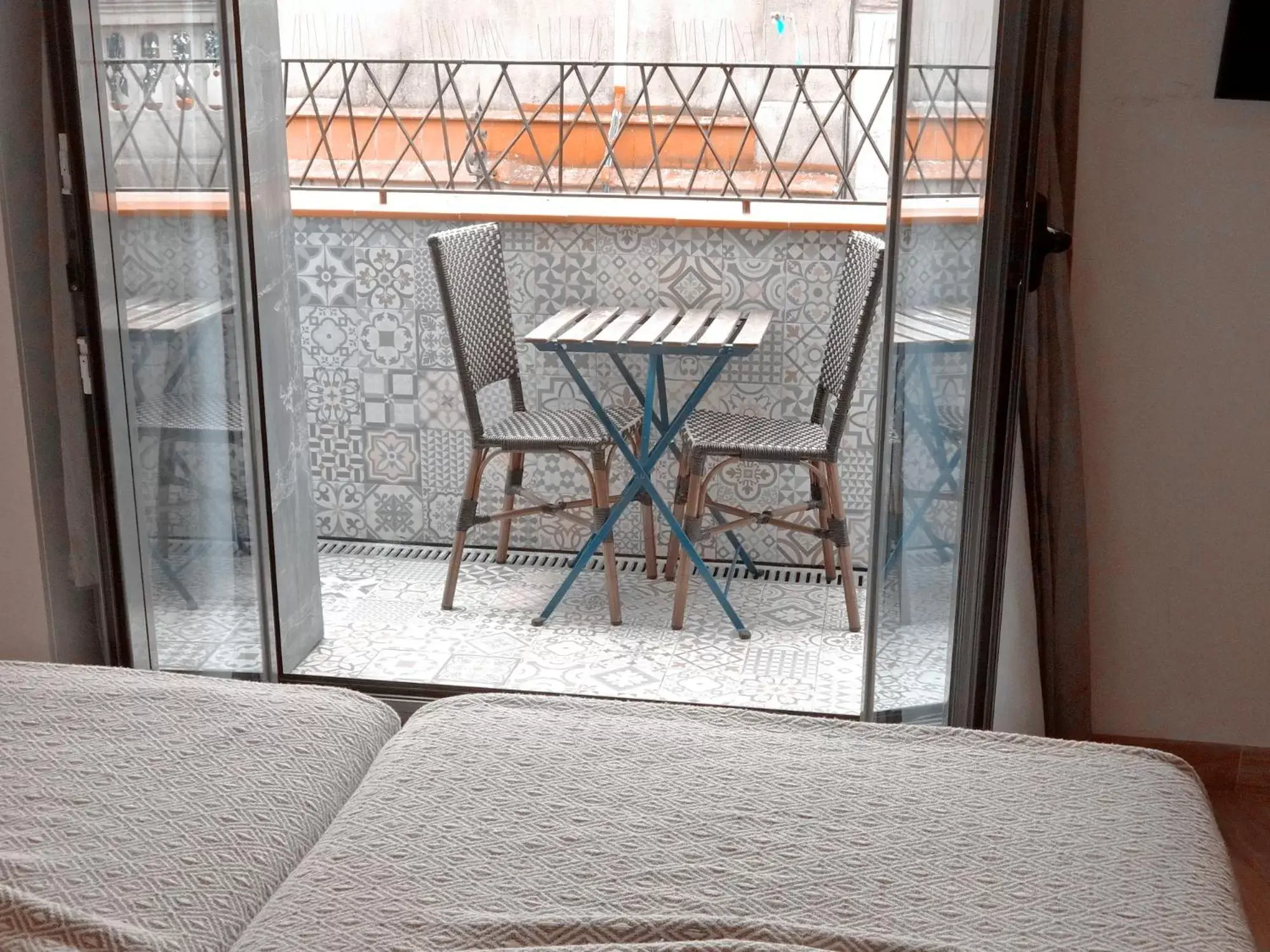Bed, Balcony/Terrace in Hotel Lloret Ramblas