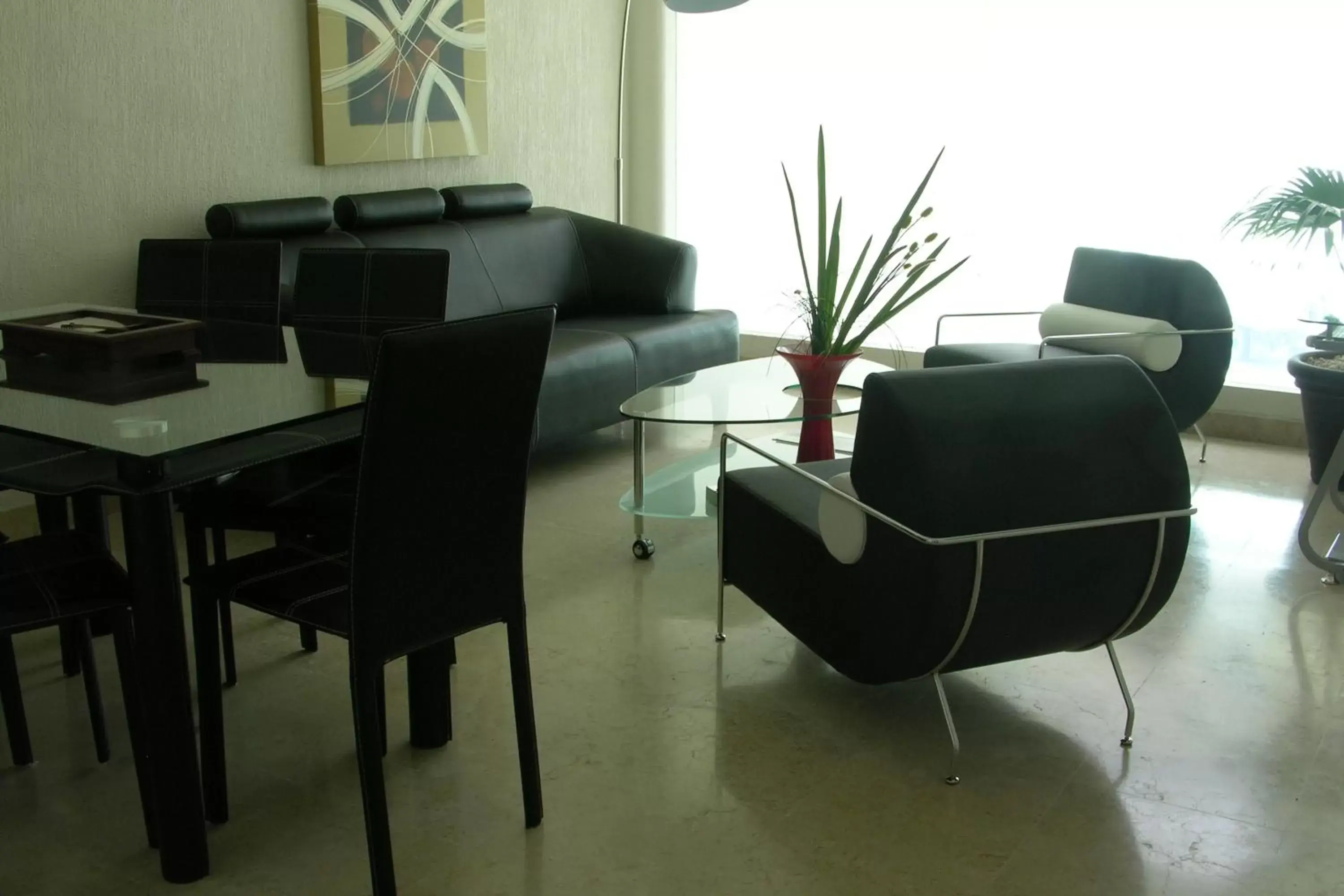 Communal lounge/ TV room, Seating Area in Homesuites Rotarismo
