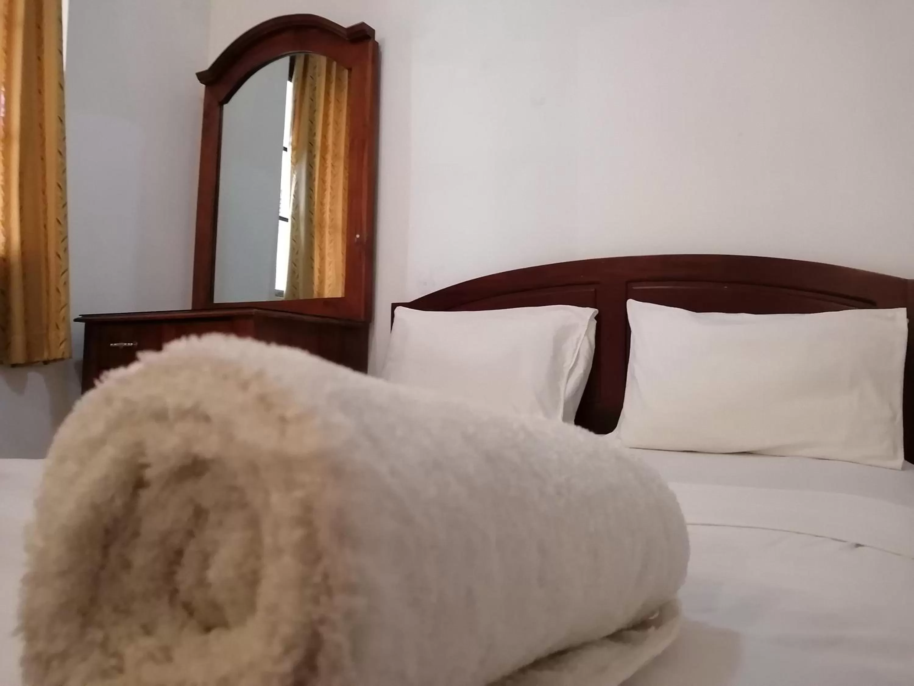 Bed in Kandy Unique Hotel