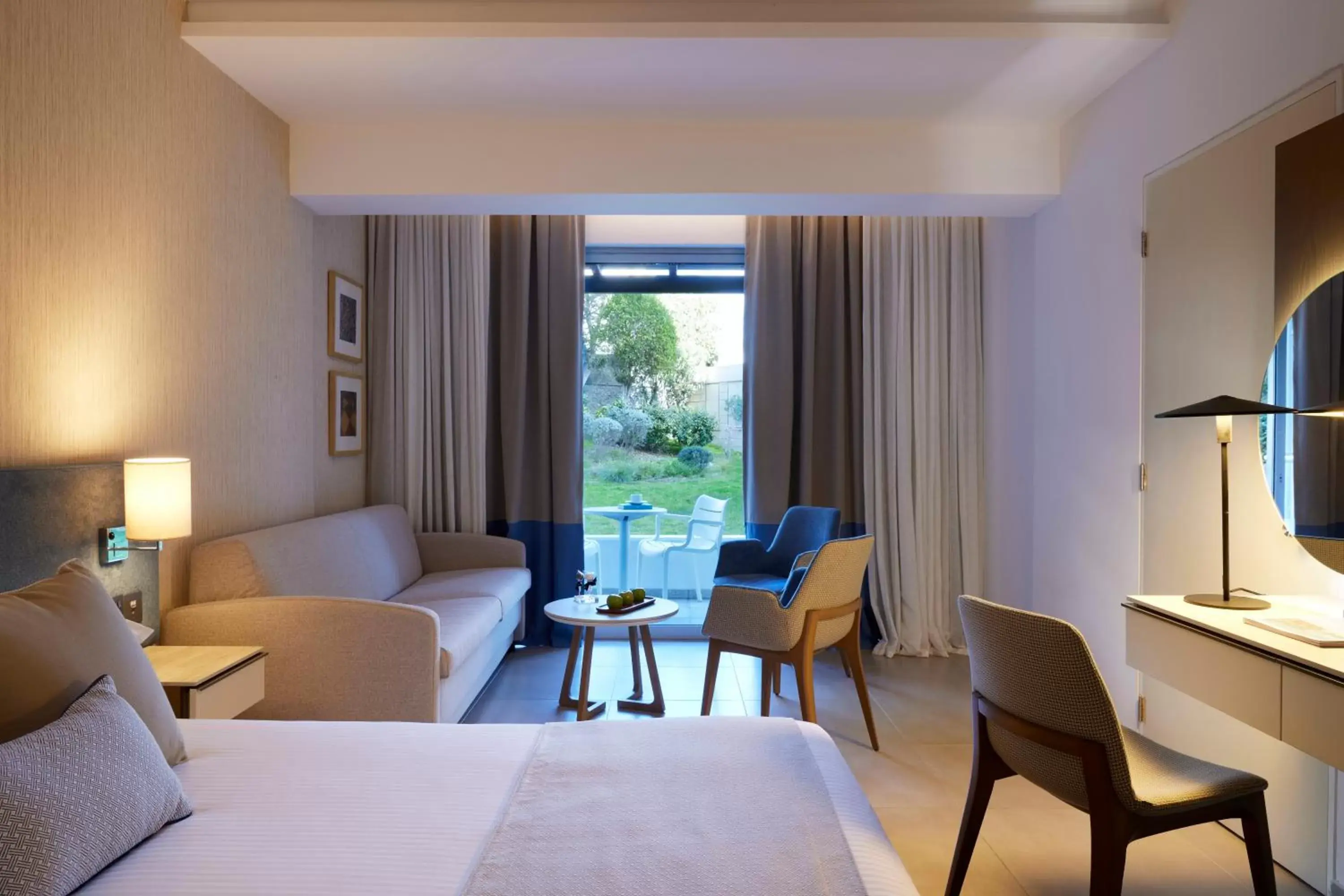 Bedroom, Seating Area in Mediterranean Beach Hotel