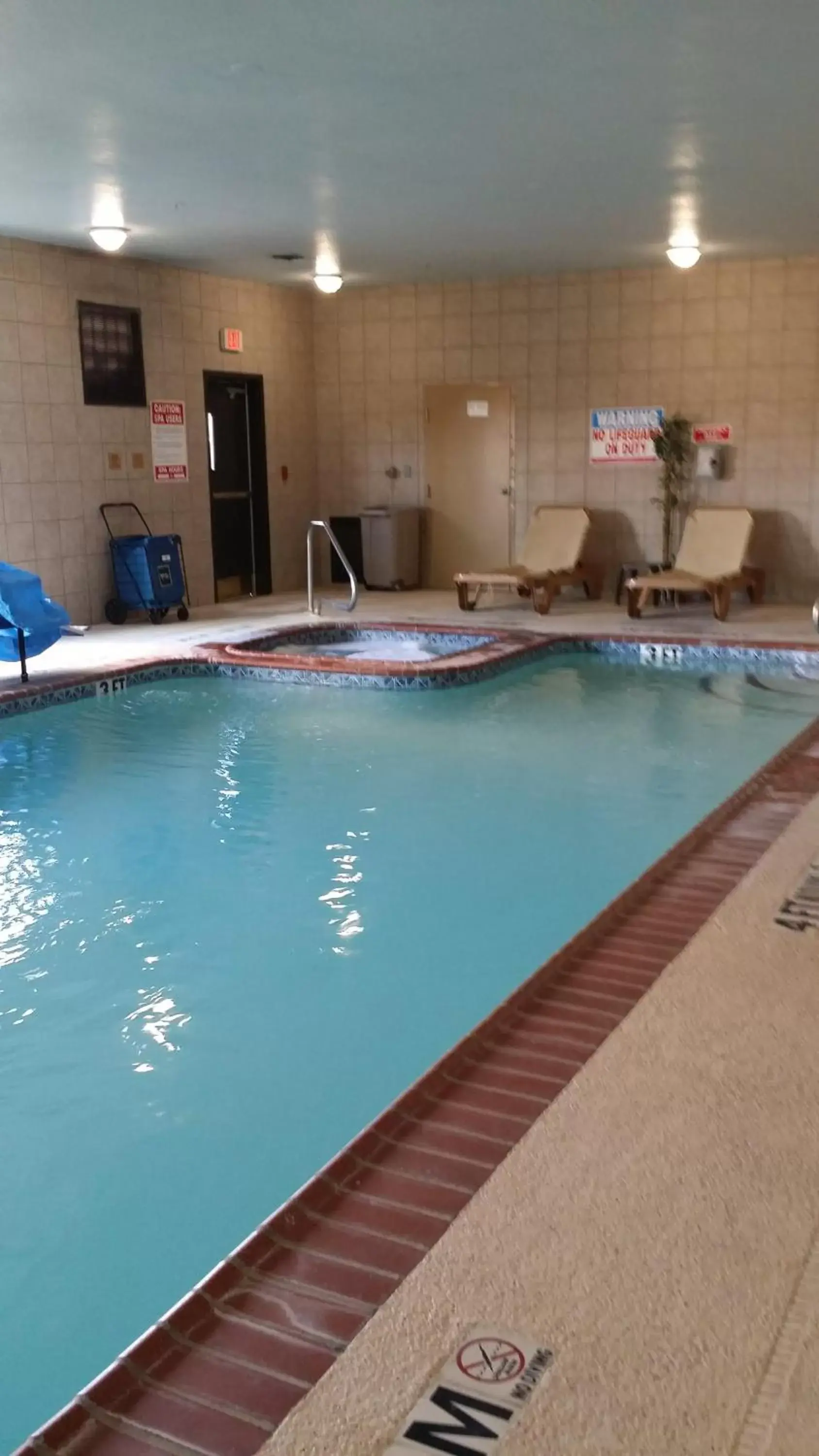 Swimming Pool in SureStay Plus Hotel by Best Western Near SeaWorld San Antonio