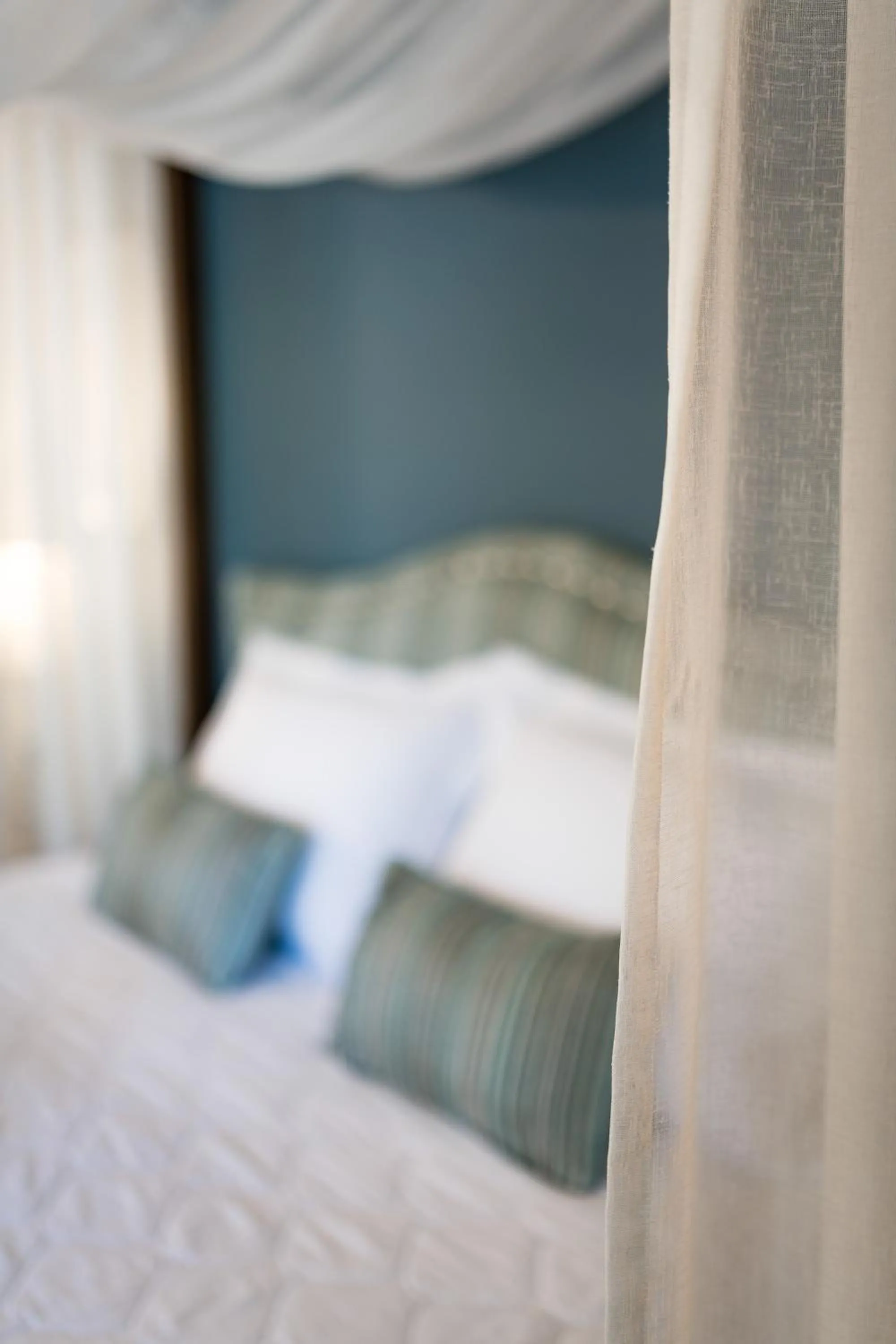 Bed in Anthemion Suites and Villas