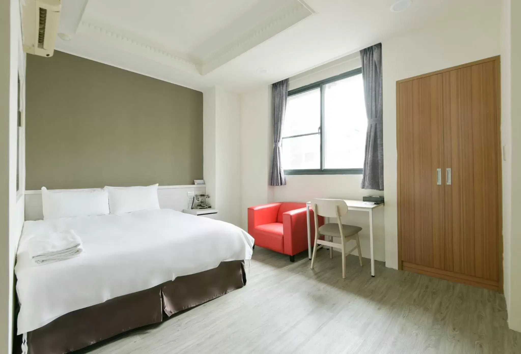 Bed in Raise Hotel Taichung