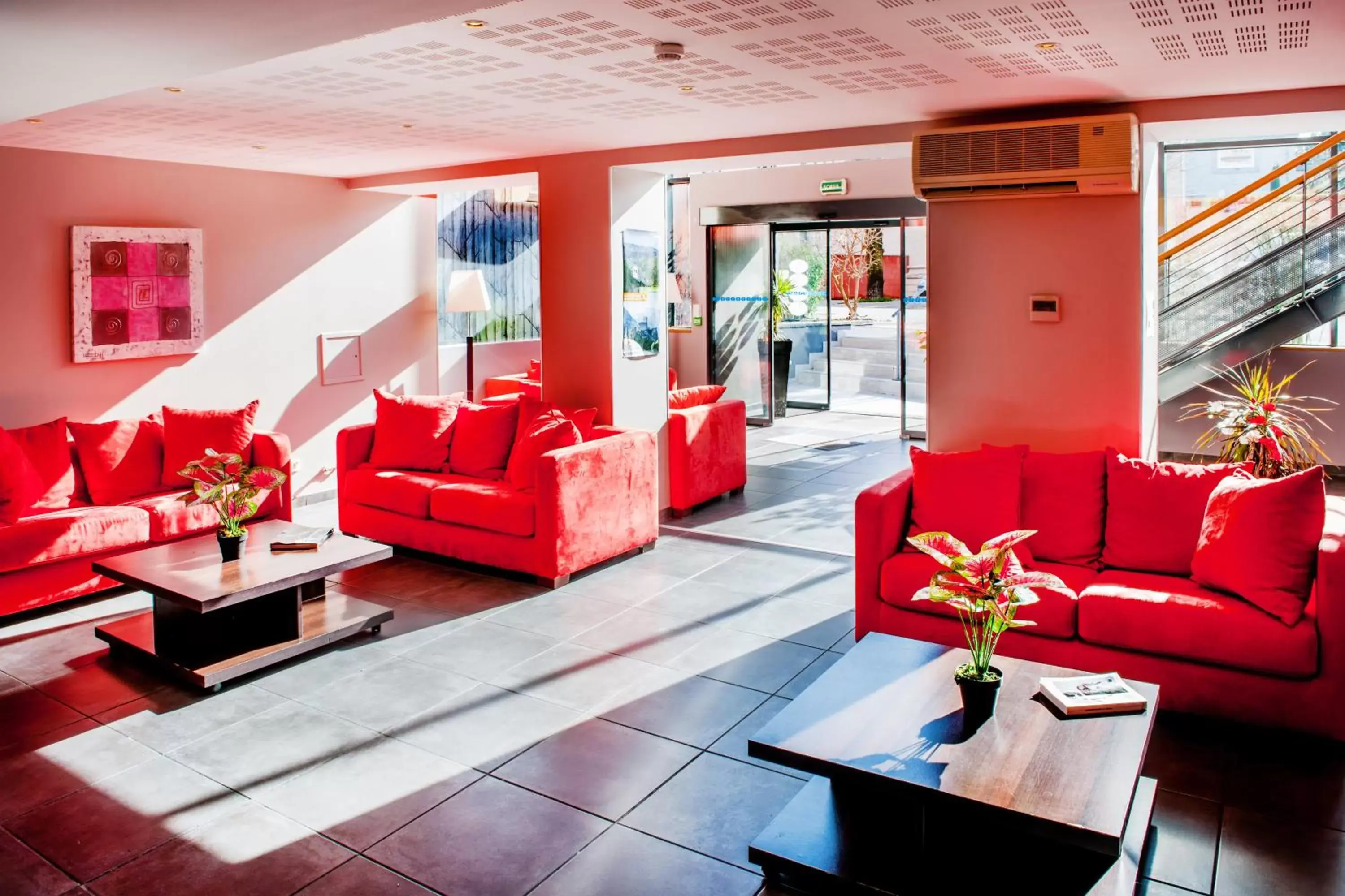 Communal lounge/ TV room, Lobby/Reception in Zenitude Hôtel-Résidences Les Jardins de Lourdes