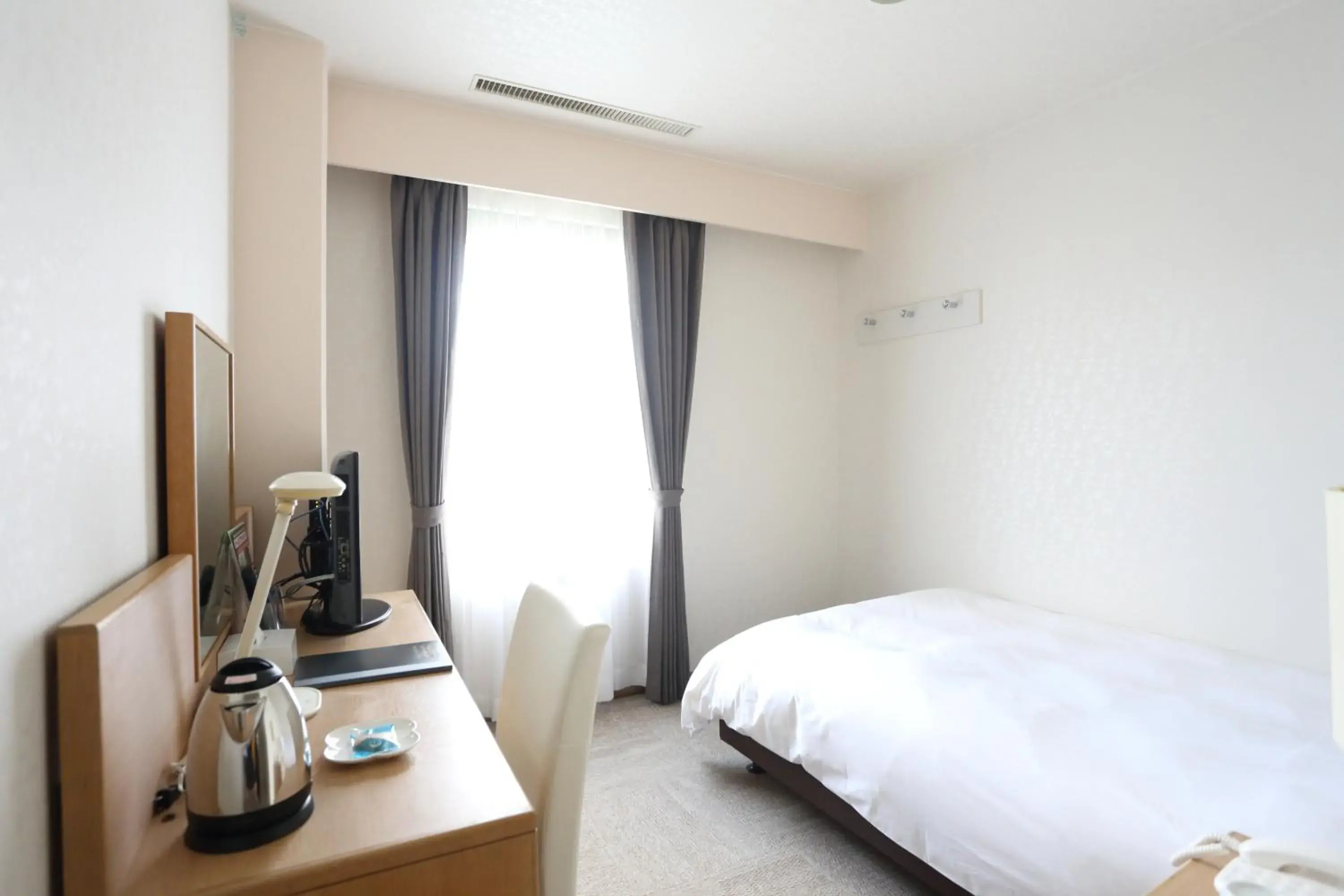 Bed in Hotel International House Osaka