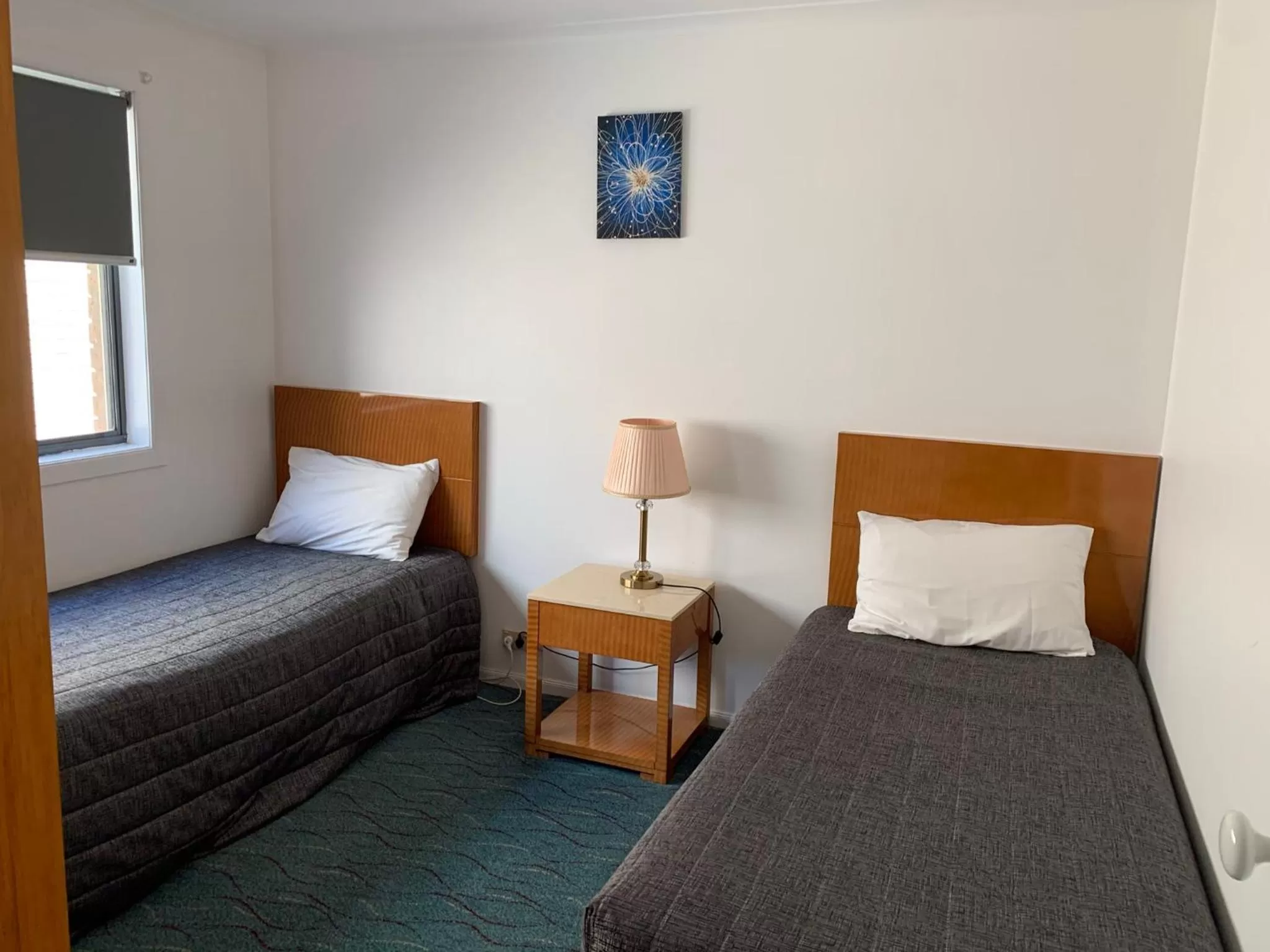 Bed in Swaggers Motor Inn