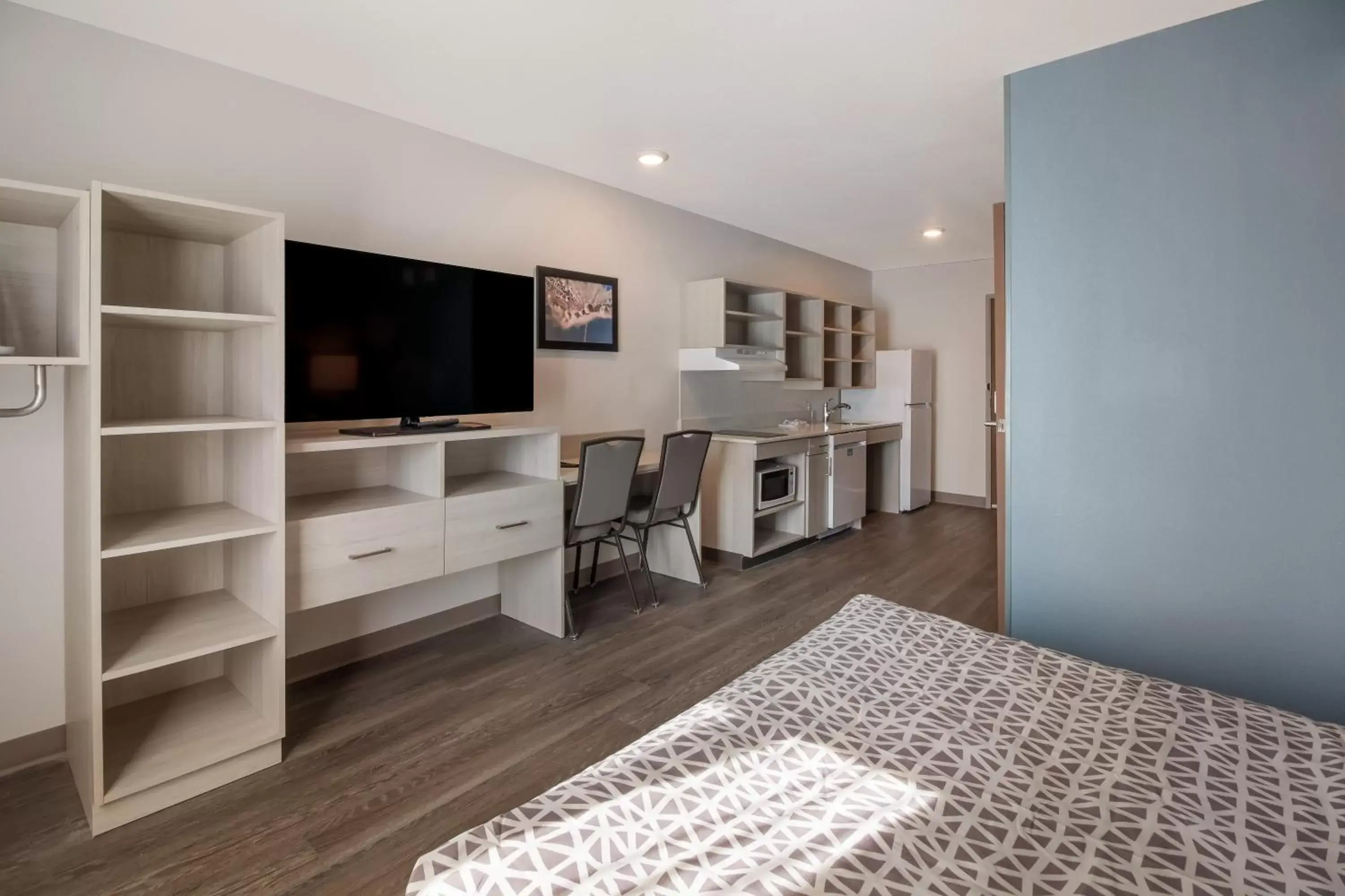 Photo of the whole room, TV/Entertainment Center in WoodSpring Suites Smyrna-La Vergne