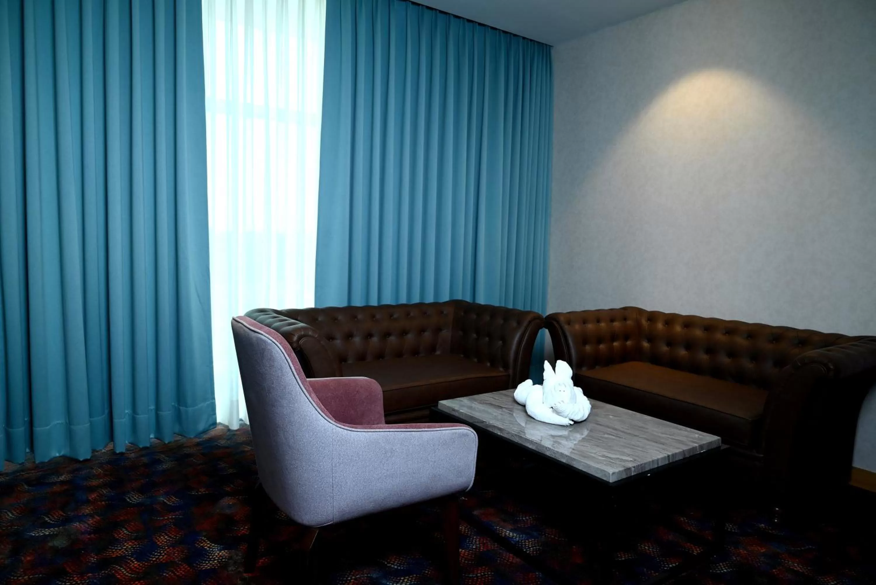 Seating area in Ramada Plaza by Wyndham Jammu Vijaypur
