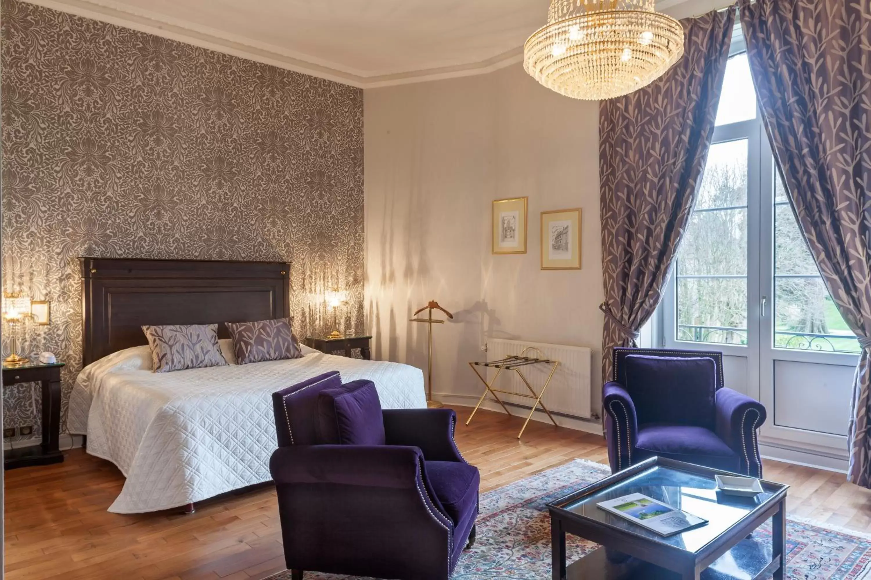 Bedroom, Seating Area in Grand Hôtel "Château de Sully" - Piscine & Spa