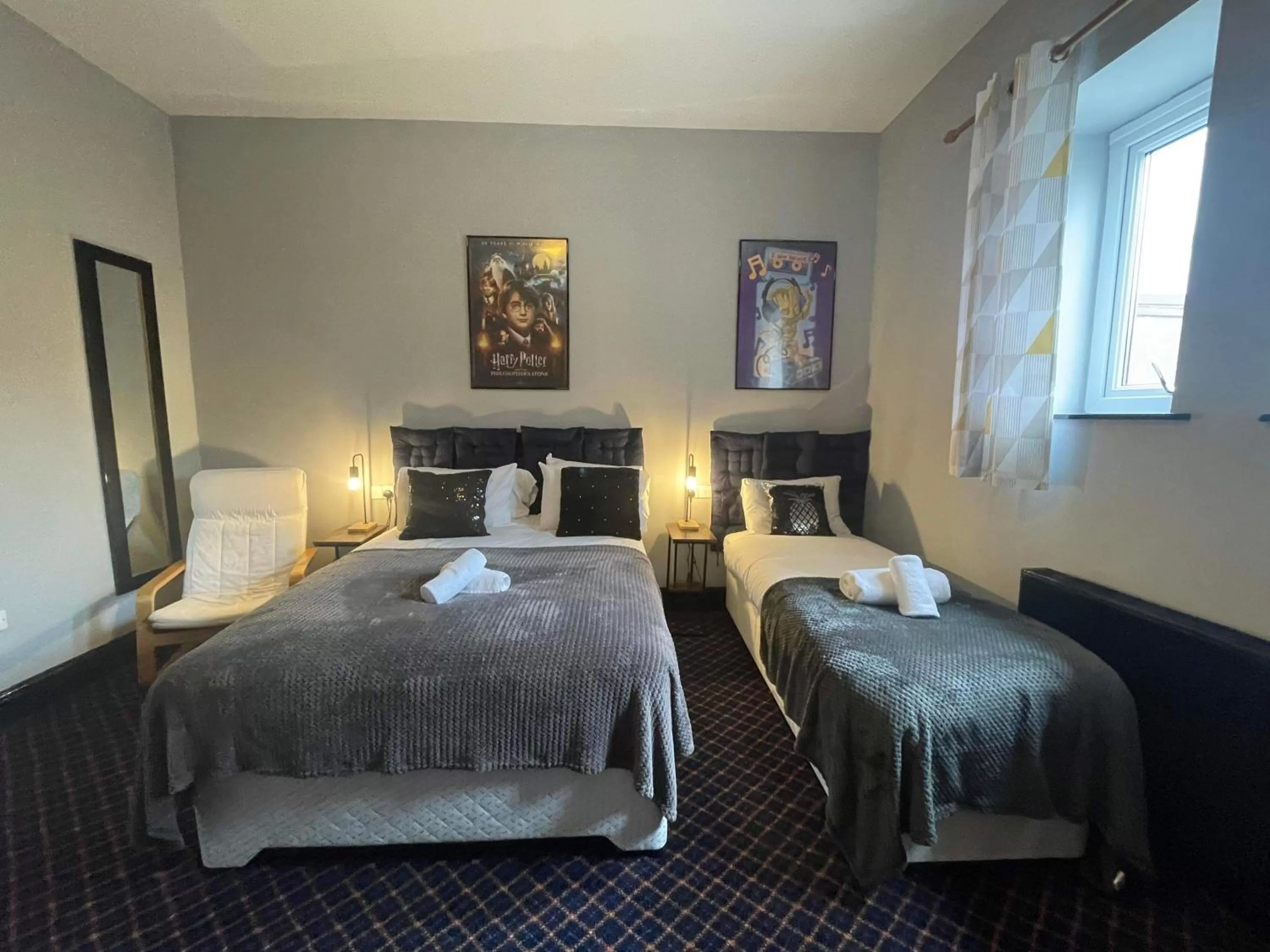 Bed in Bay view rooms at Mentone Hotel