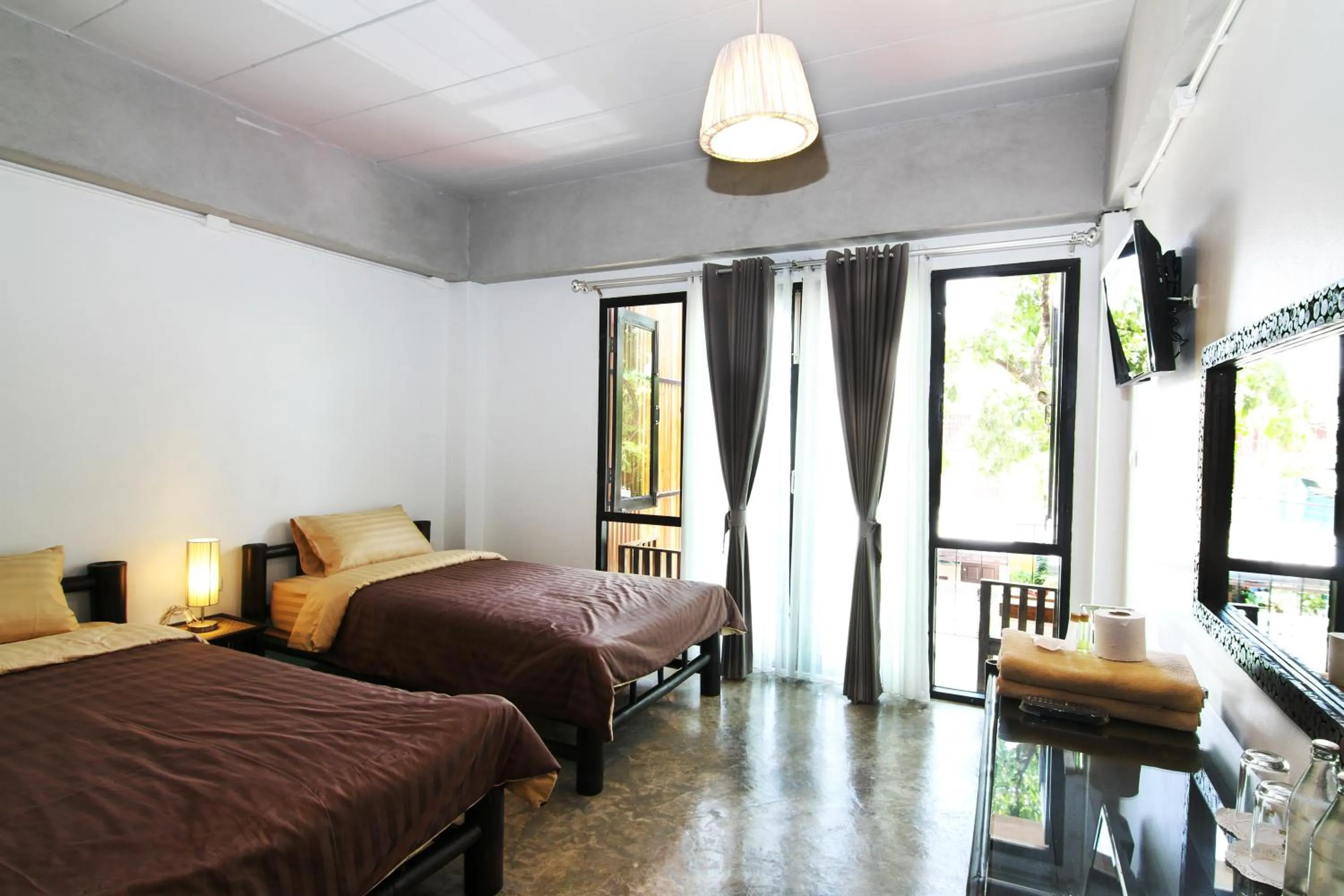 Bed in Lamphu House Chiang Mai