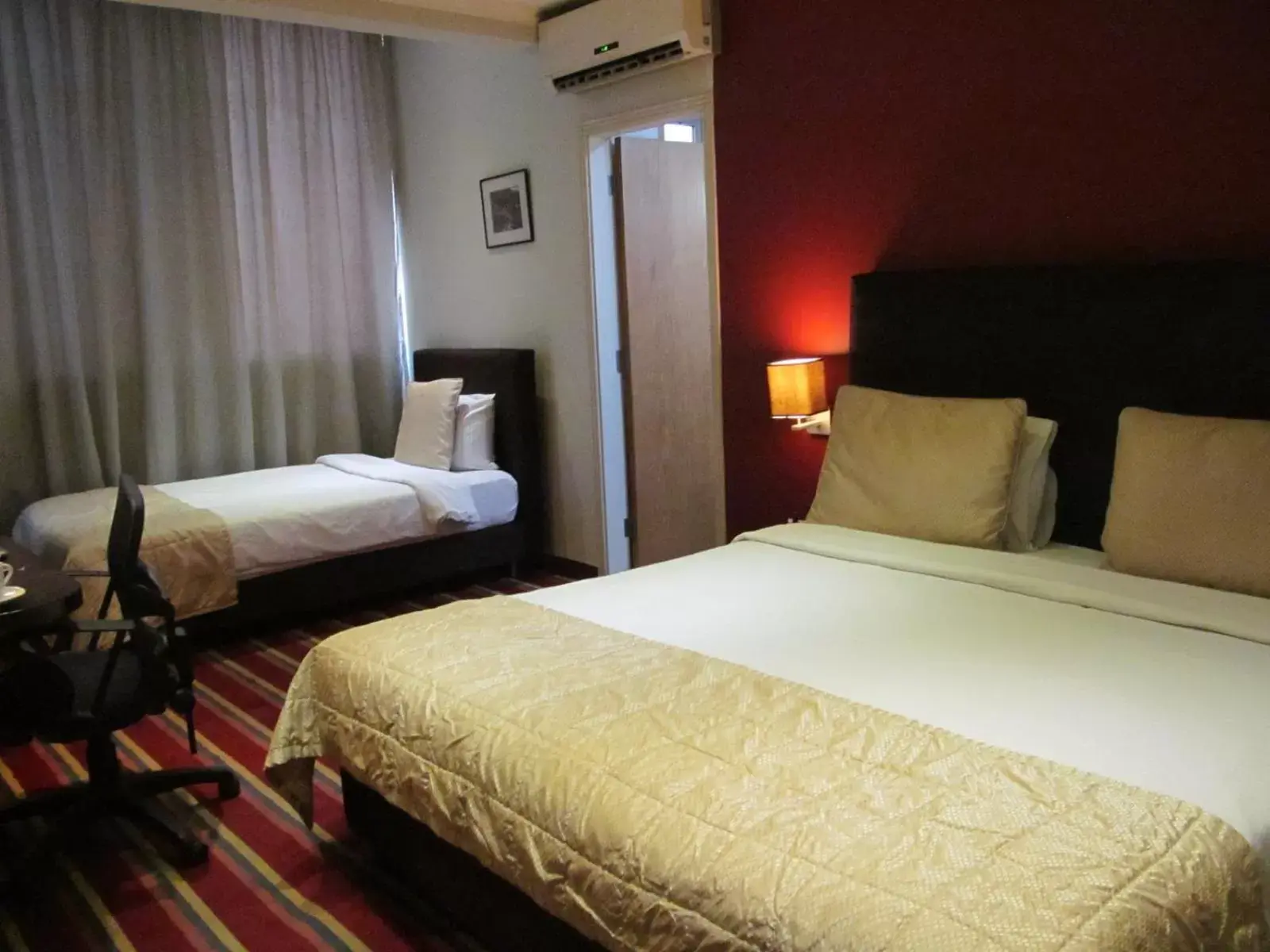 Photo of the whole room, Bed in The J Hotel & Spa