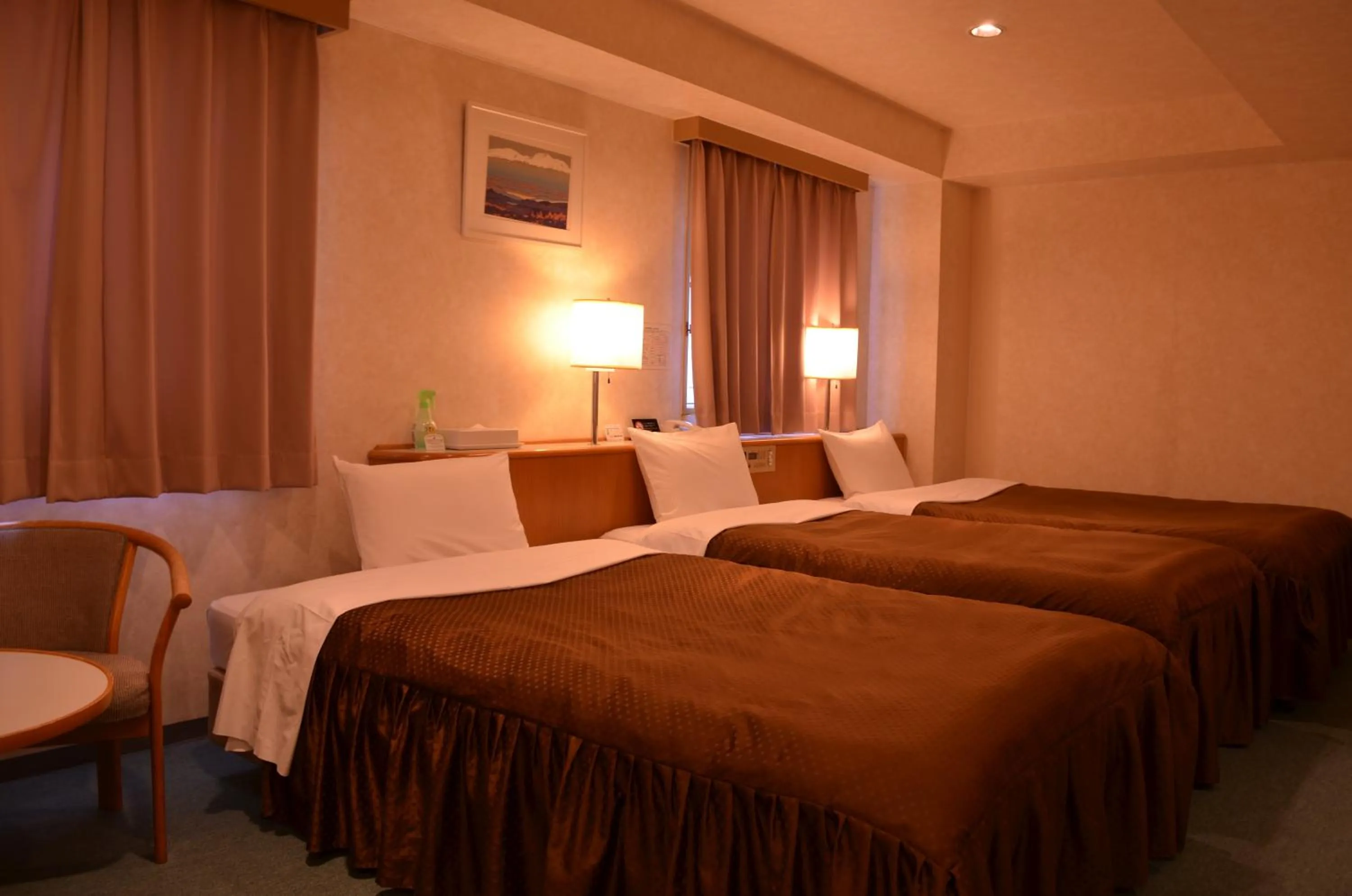 Property building, Bed in Southern Cross Inn Matsumoto