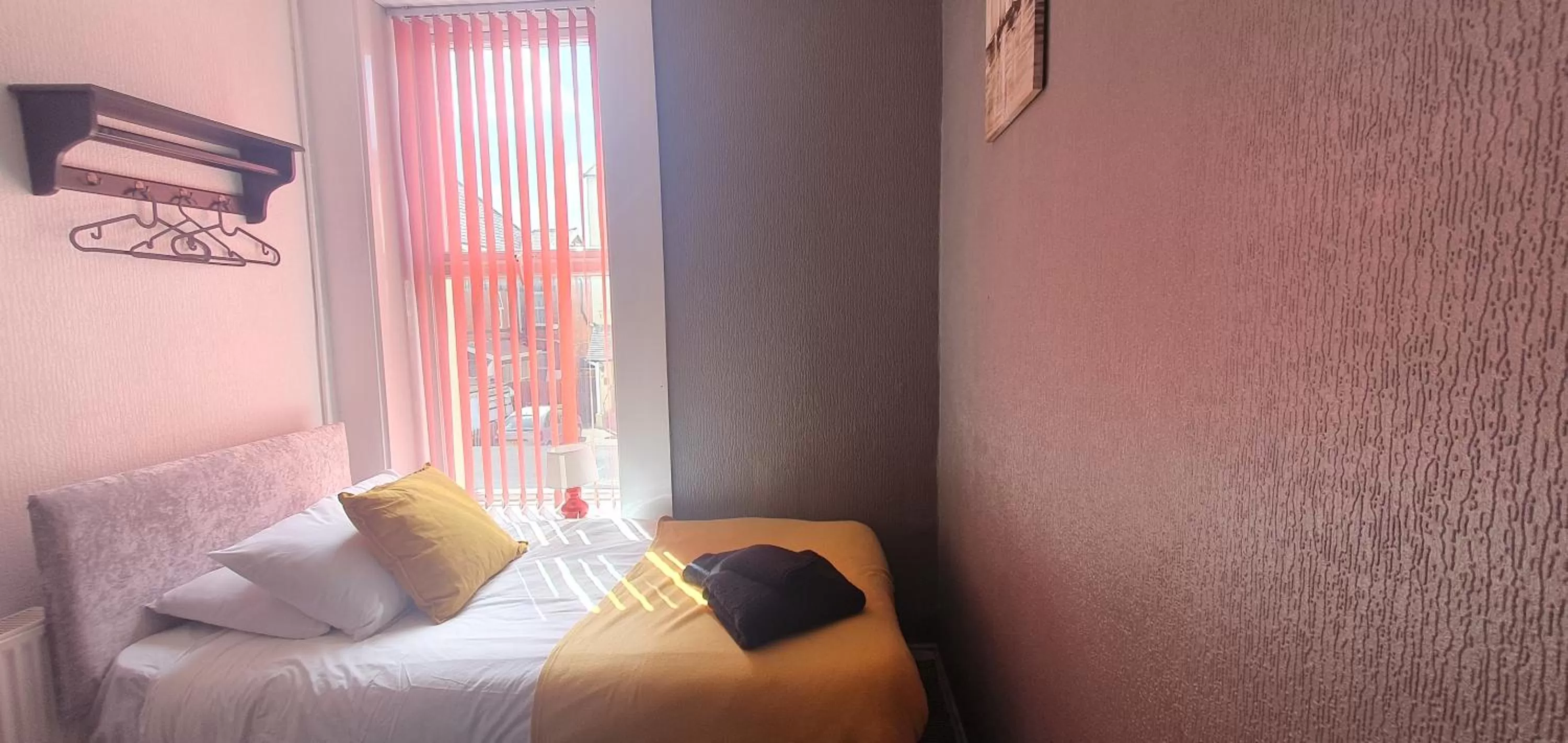 Bed in Palm Beach Hotel by the Sea