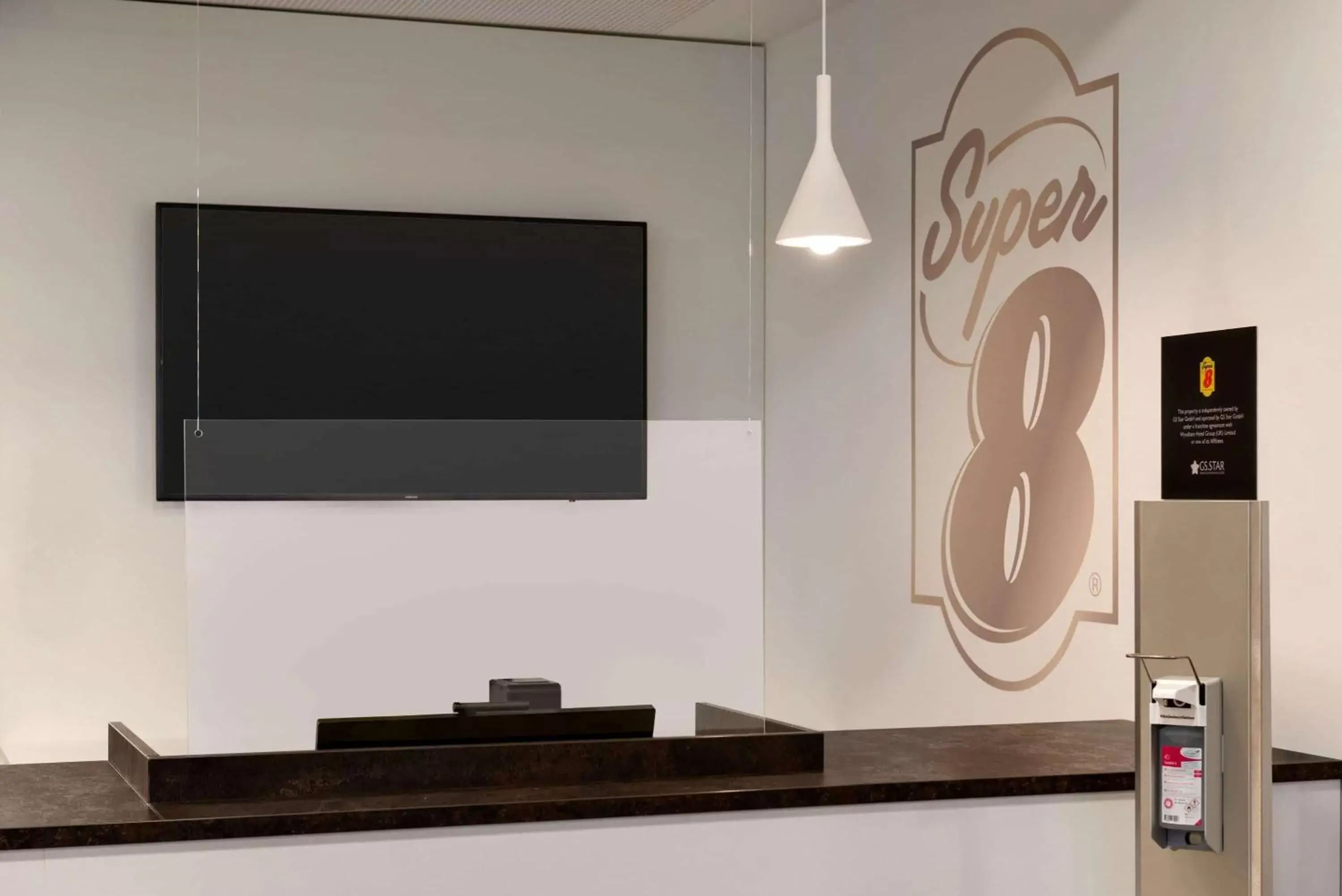 Lobby or reception in Super 8 by Wyndham Augsburg Lobby or reception in Super 8 by Wyndham Augsburg