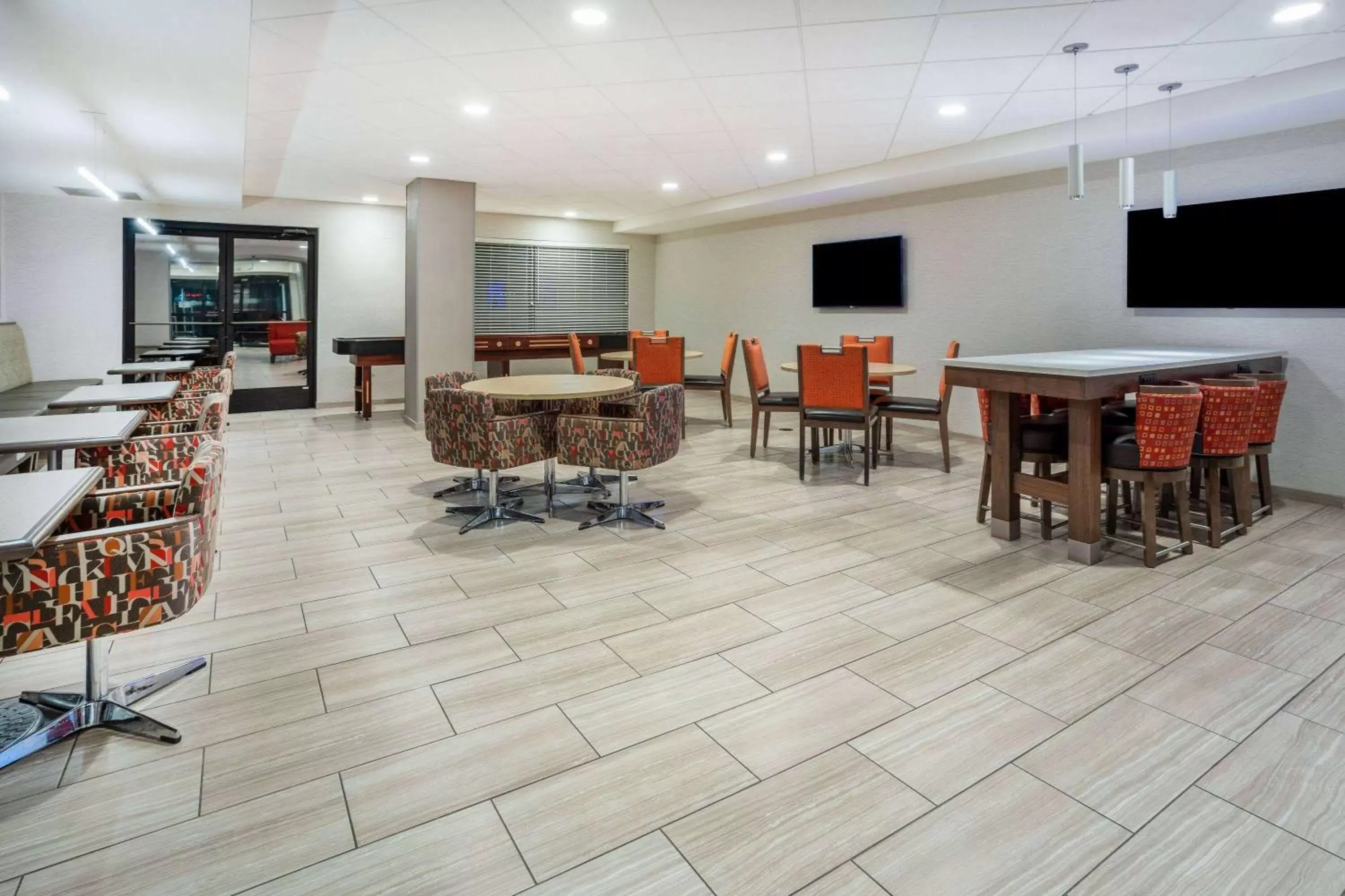 Lobby or reception in Days Inn & Suites by Wyndham Denver International Airport