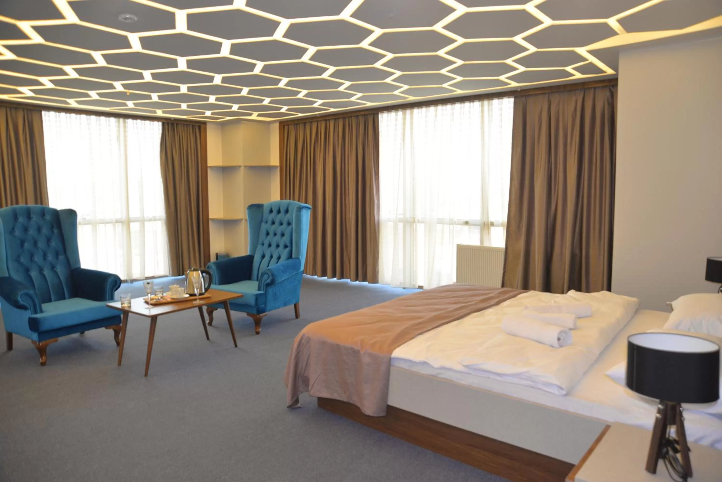 Bed in TEVETOGLU HOTEL