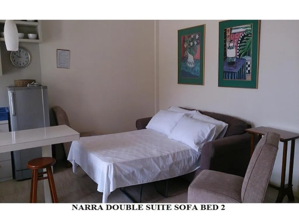 Bed in Agreeable Family Baguio Suites