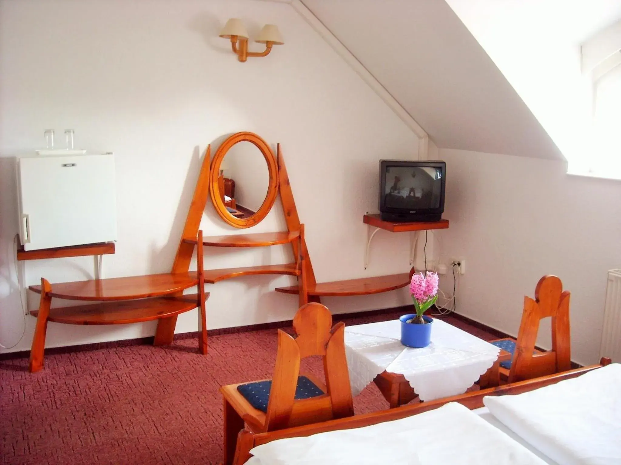 Bedroom, TV/Entertainment Center in Fodor Hotel