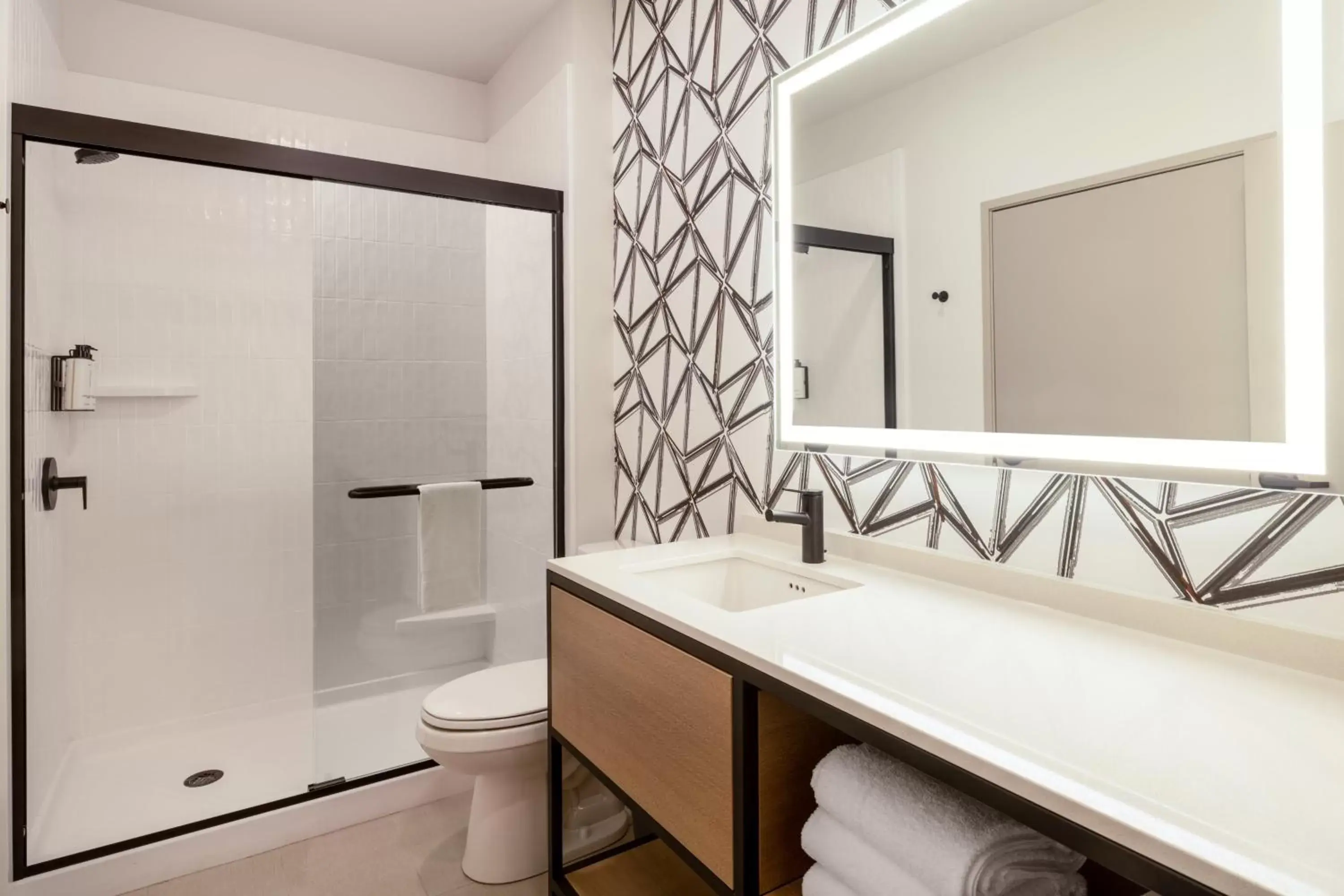 Bathroom in Atwell Suites - DENVER AIRPORT TOWER ROAD, an IHG Hotel
