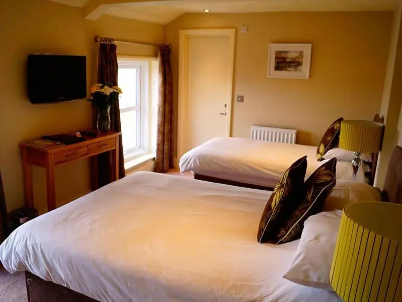 Bed in The Arun View Inn