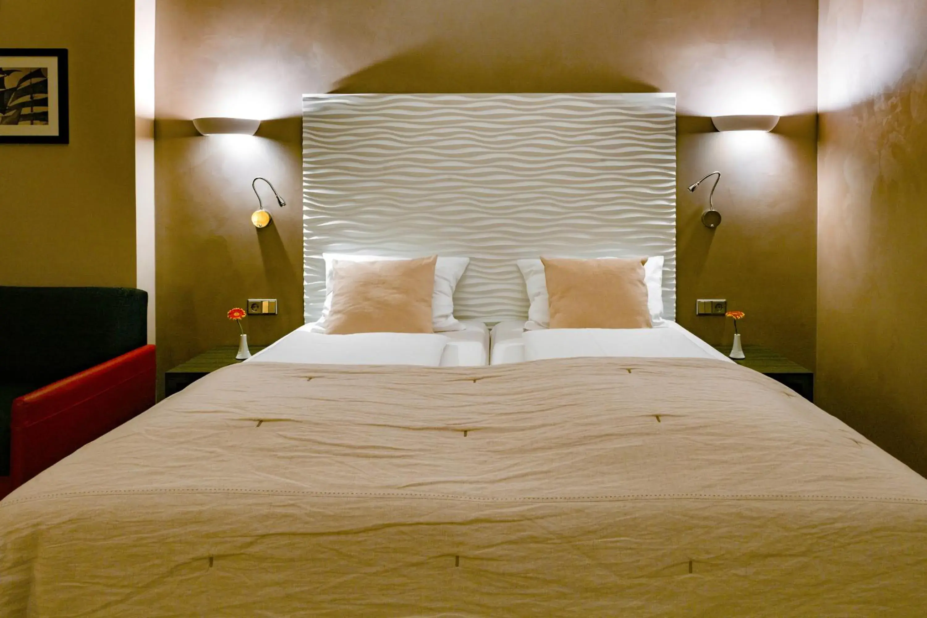 Bed in Artim Hotel