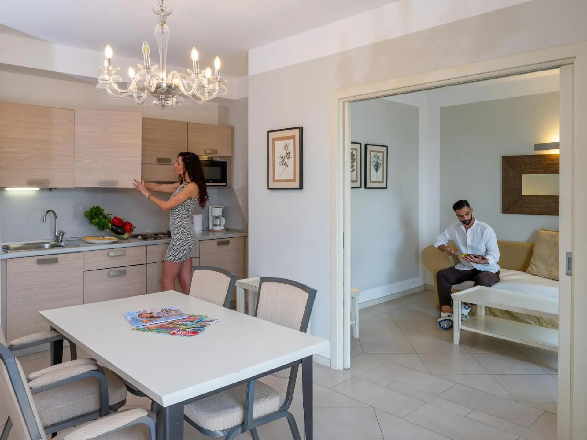 Kitchen or kitchenette in Parc Hotel Germano Suites & Apartments