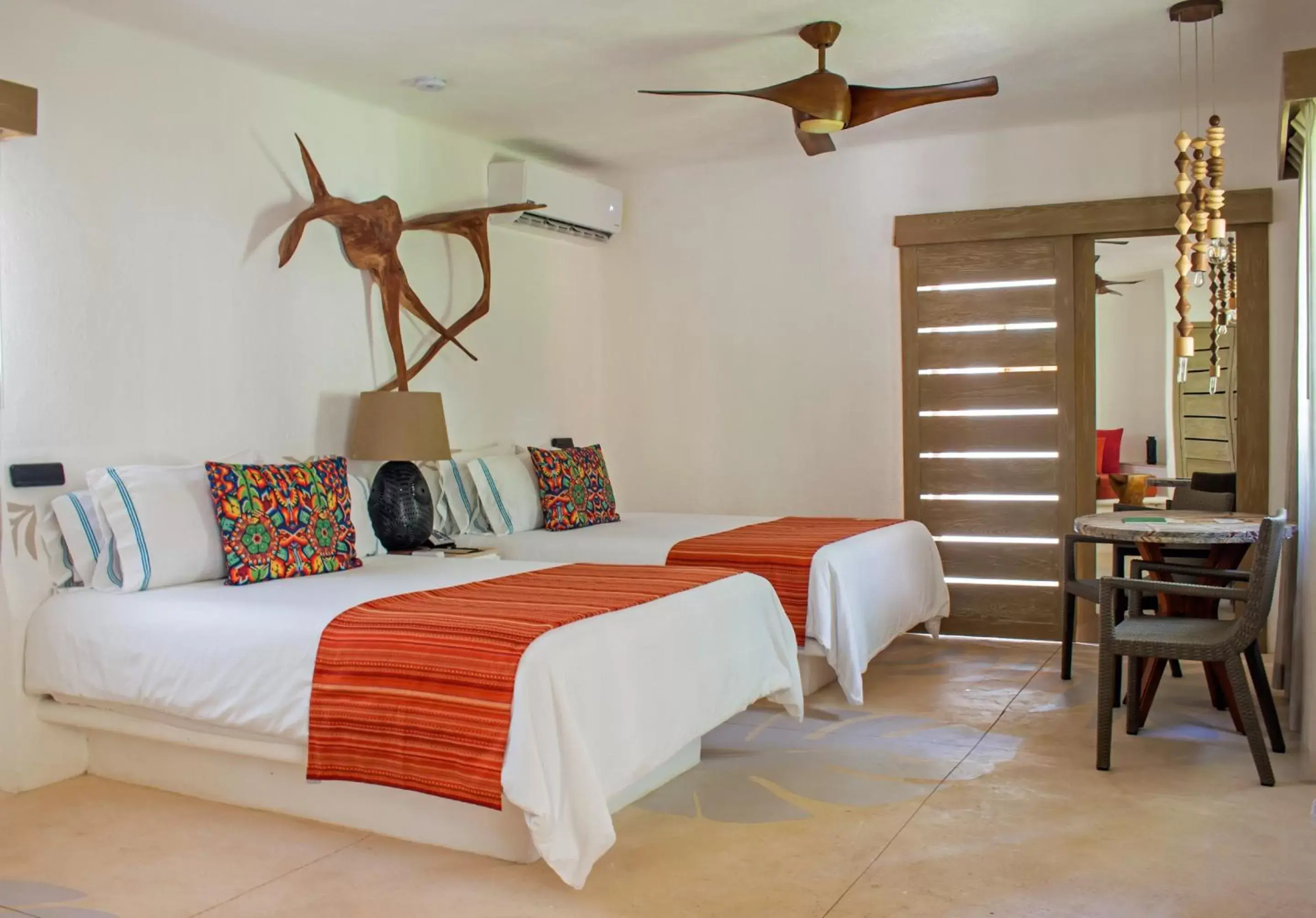 Bed in Mahekal Beach Front Resort & Spa