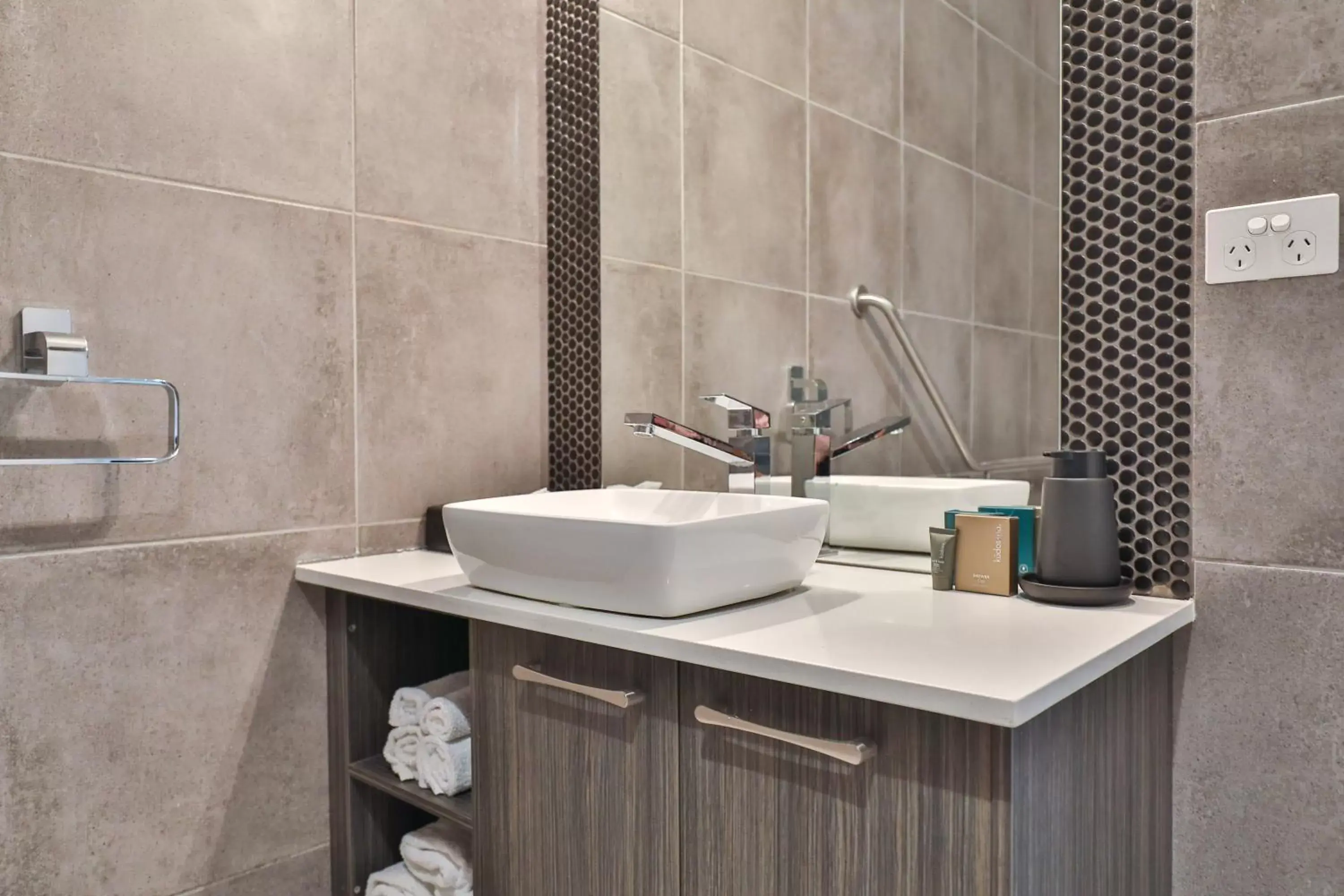 Bathroom in Indulge Apartments - CBD