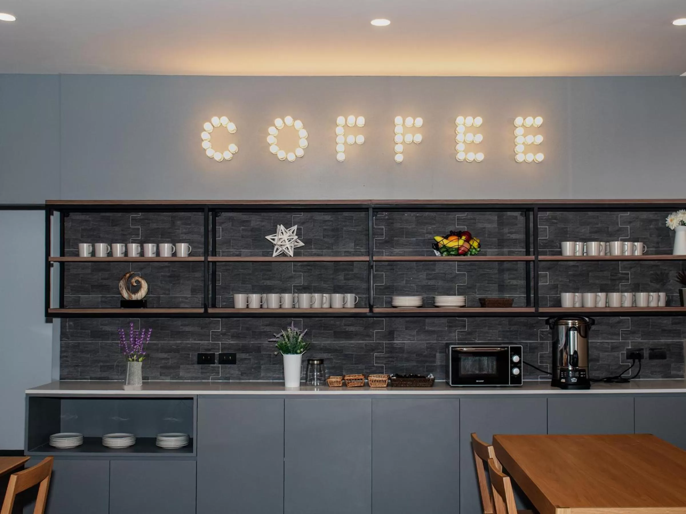 Communal kitchen in Fortune D Hotel Phitsanulok