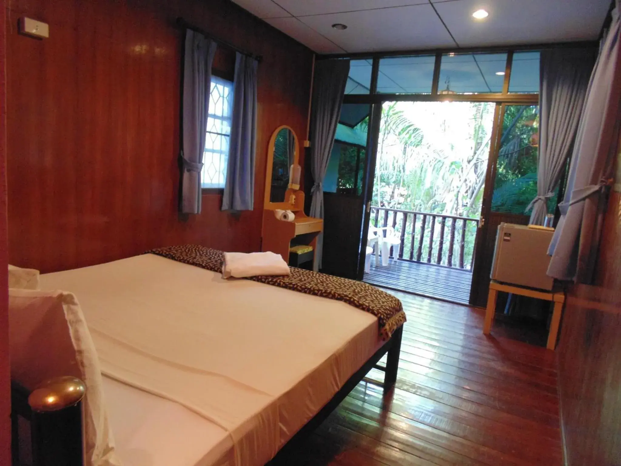 Bed in Moonhut Bungalows