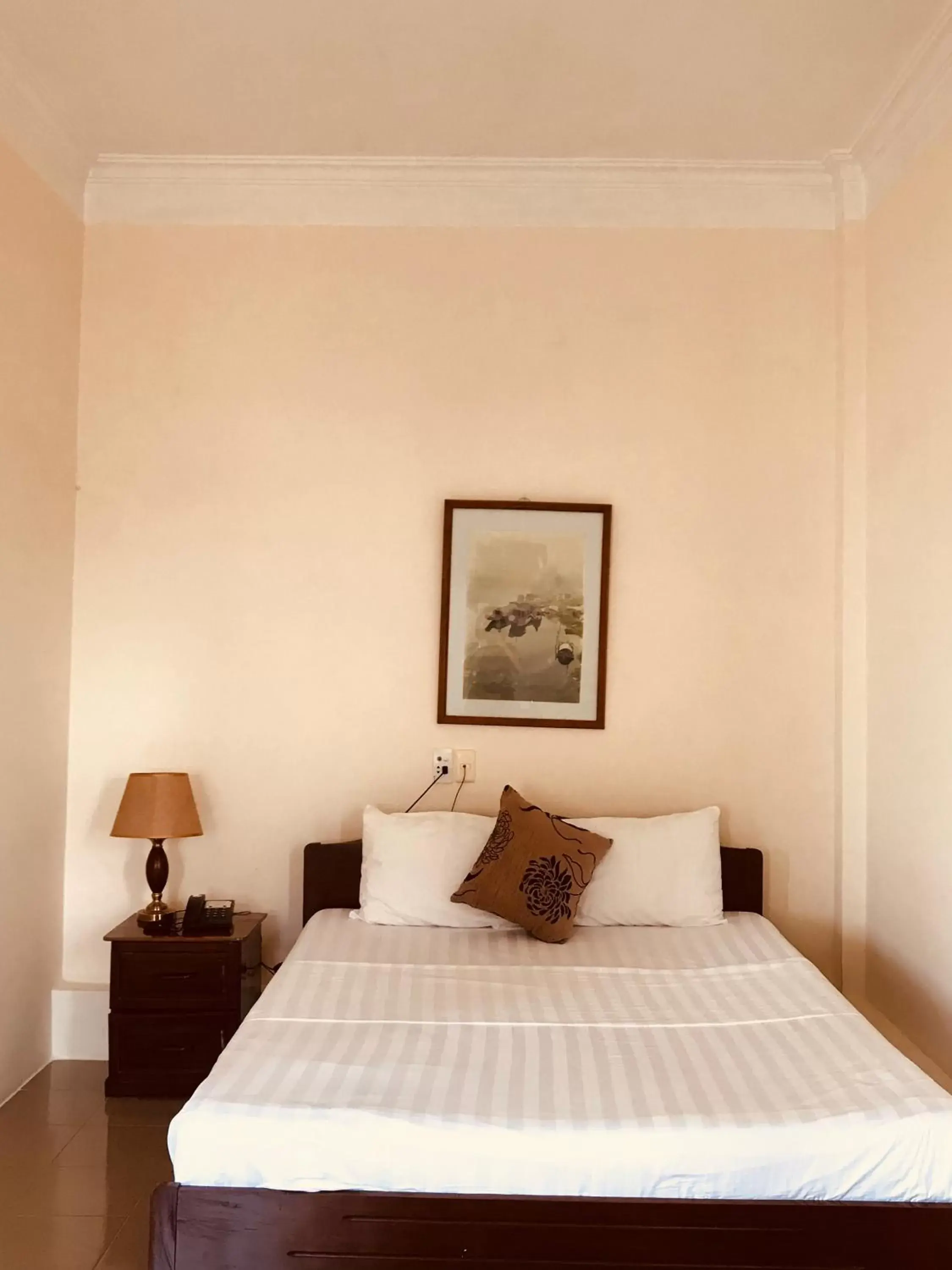 Bed in Nam Long Hotel Bed in Nam Long Hotel