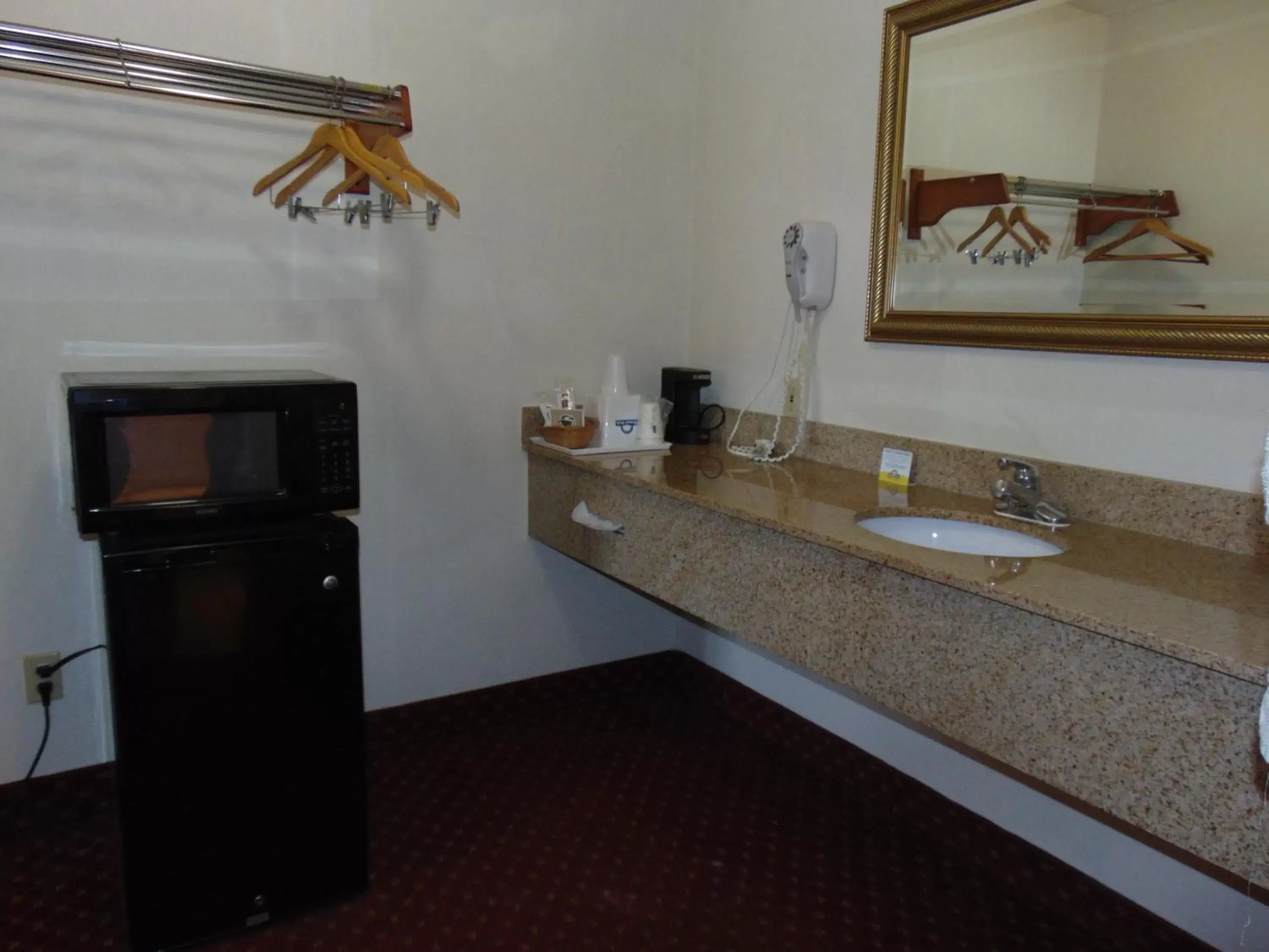 Bathroom in Days Inn by Wyndham Huntington