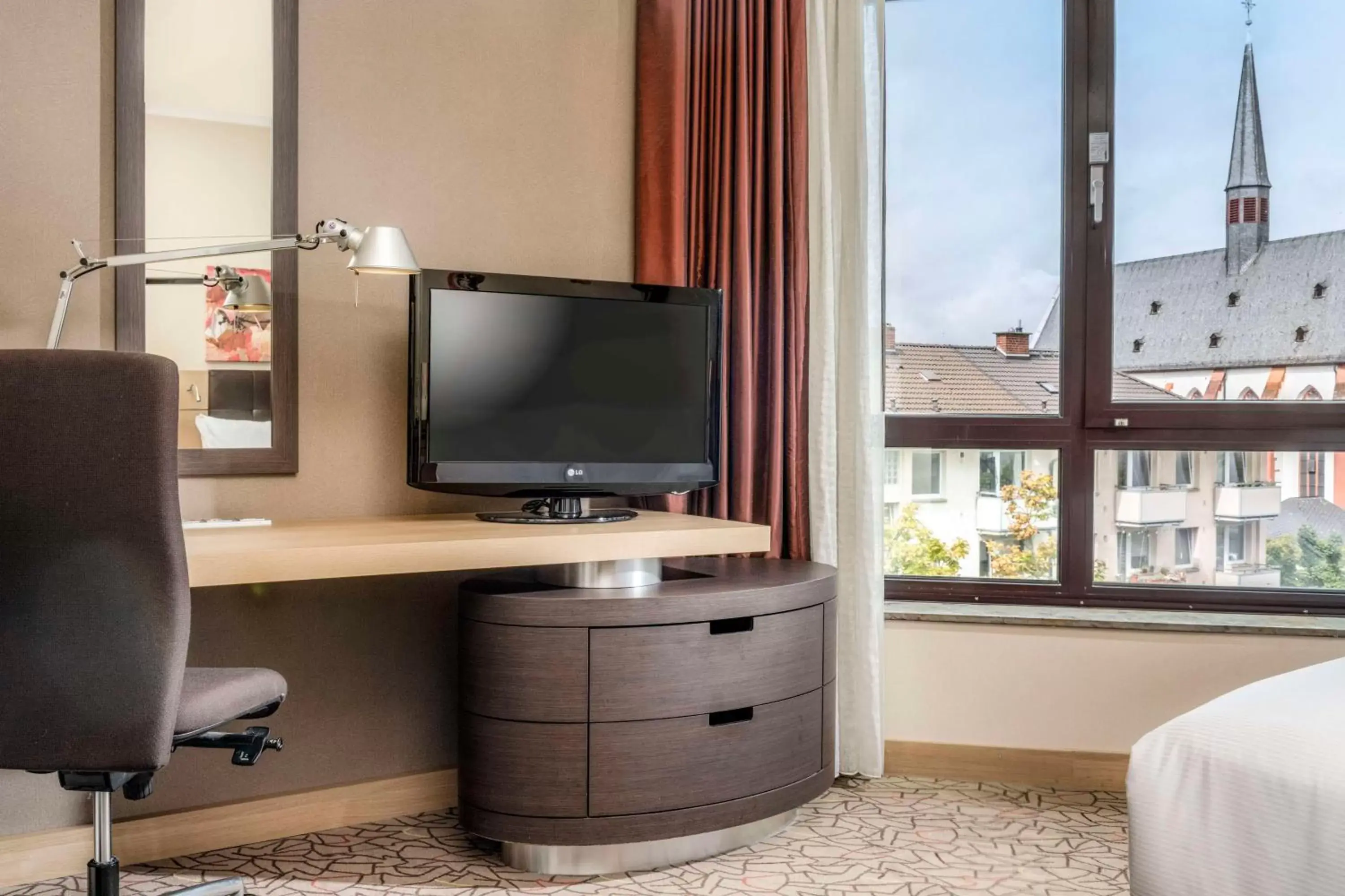 Bedroom, TV/Entertainment Center in Hilton Mainz