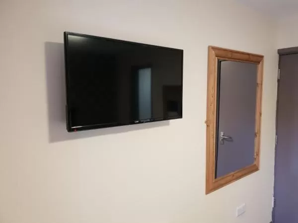 TV and multimedia in The Avenue Club and Lodge