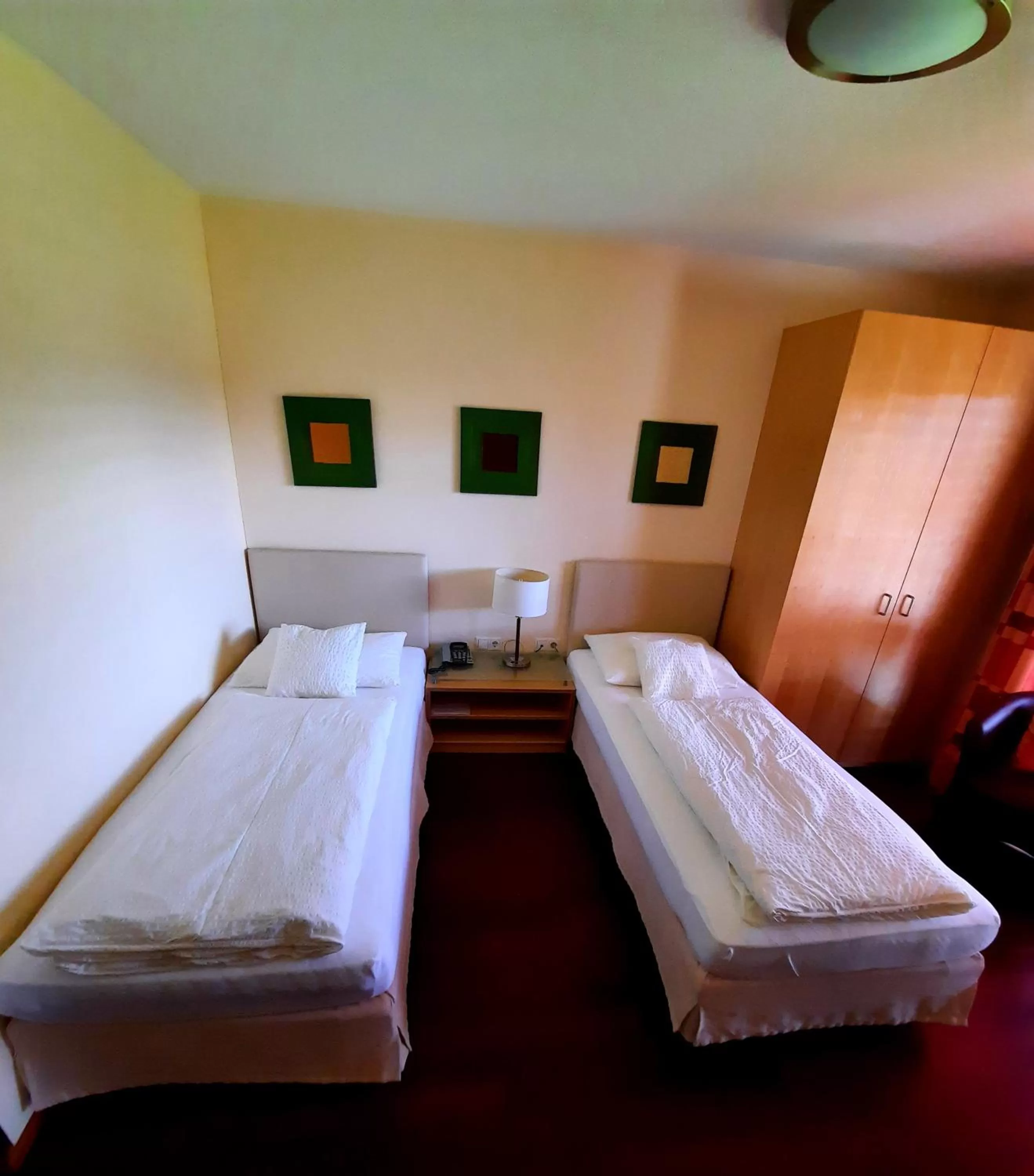 Bed in Das smarte Hotel garni