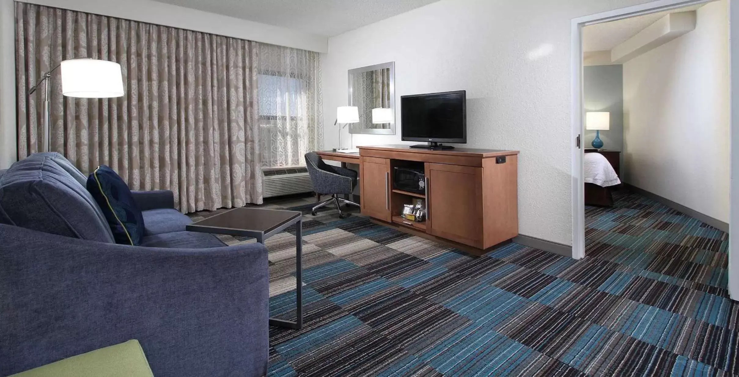 Living room, TV/Entertainment Center in Hampton Inn Tucson-Airport