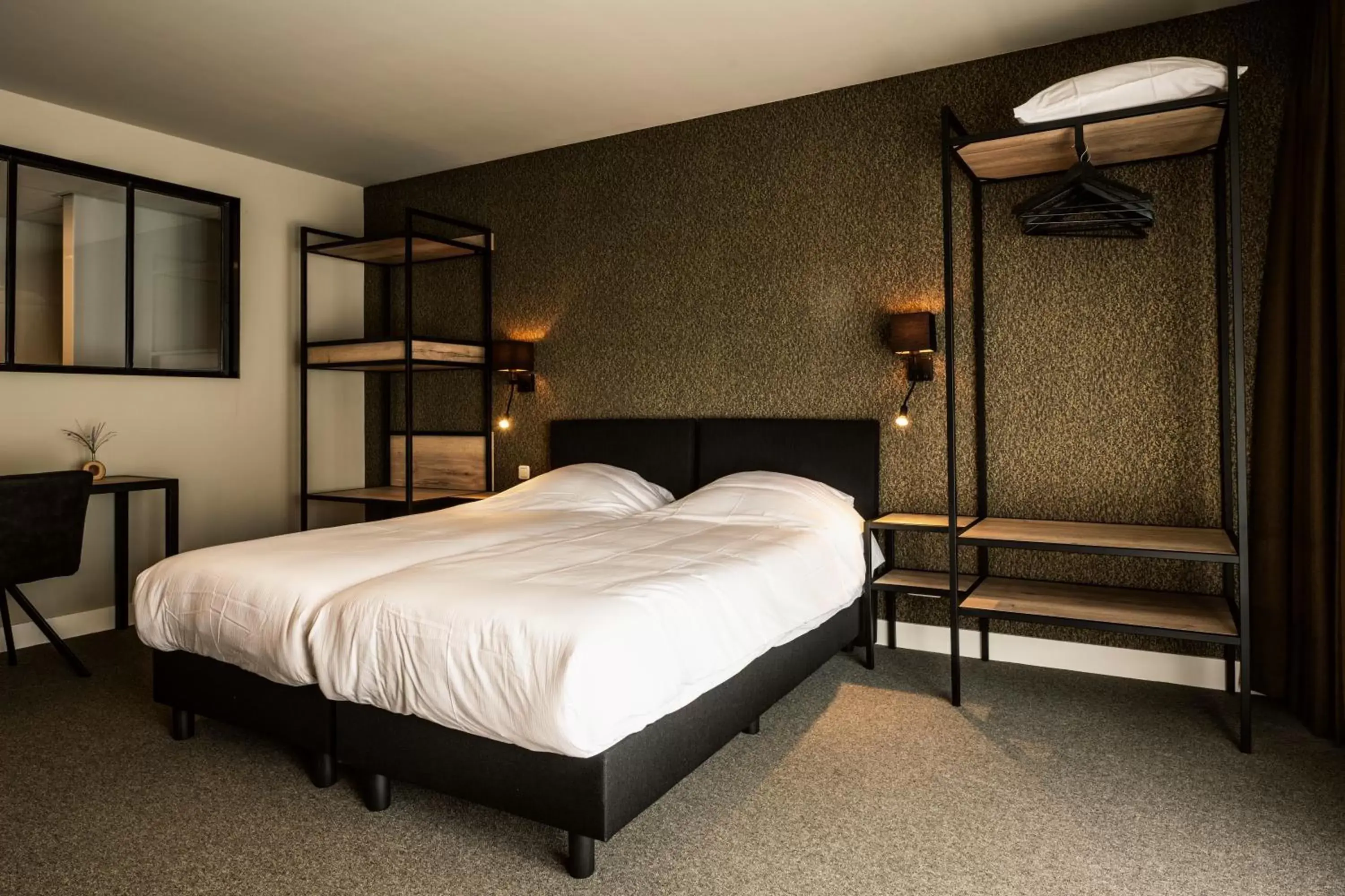 Bed in De Stobbe hotel & suites