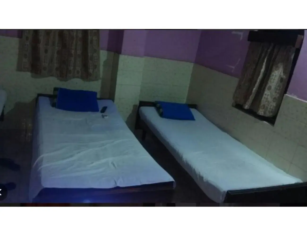 Bedroom, Bed in Goroomgo Central Guest House Agartala