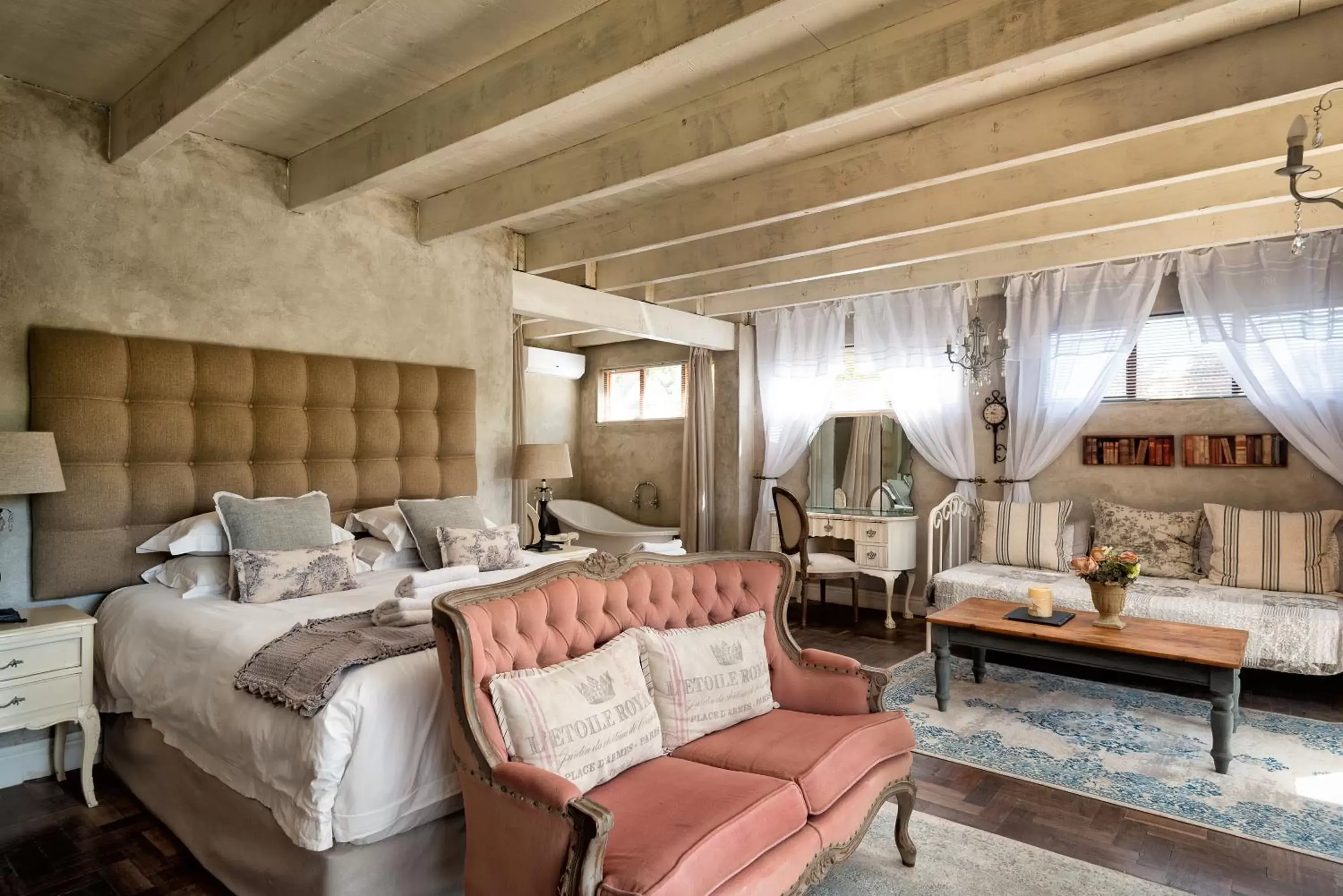 Bedroom, Seating Area in Petite Provence B&B