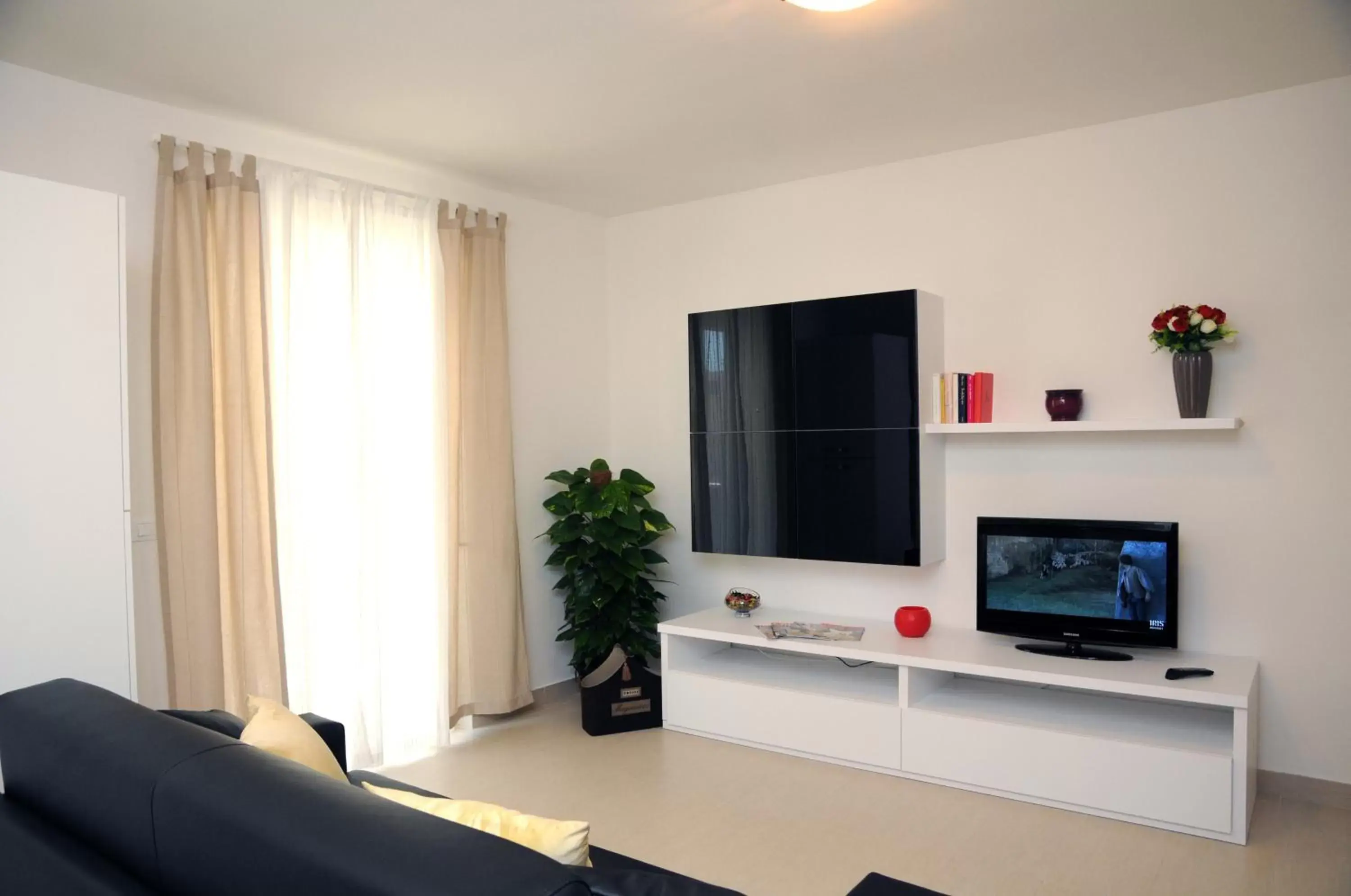 TV and multimedia, TV/Entertainment Center in Isa Residence Fiumicino Airport