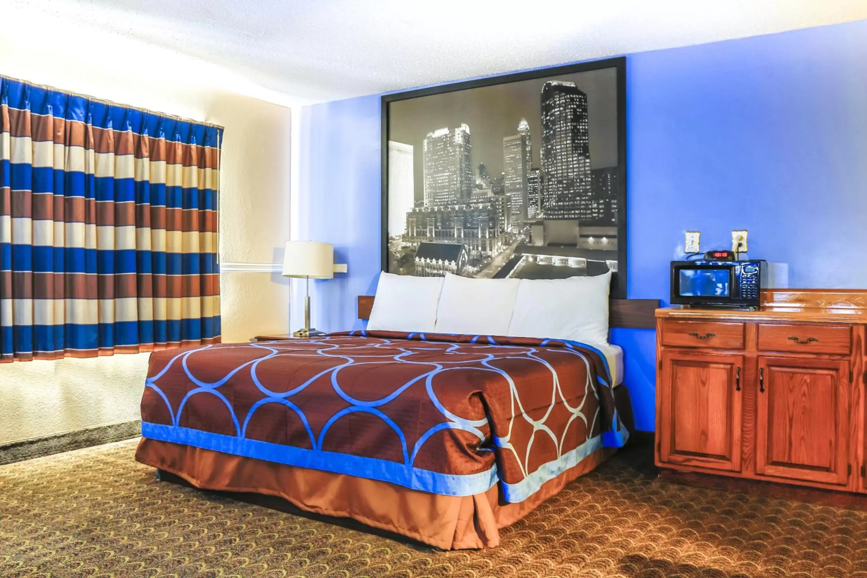 Bedroom, Bed in Super 8 by Wyndham Charlotte University