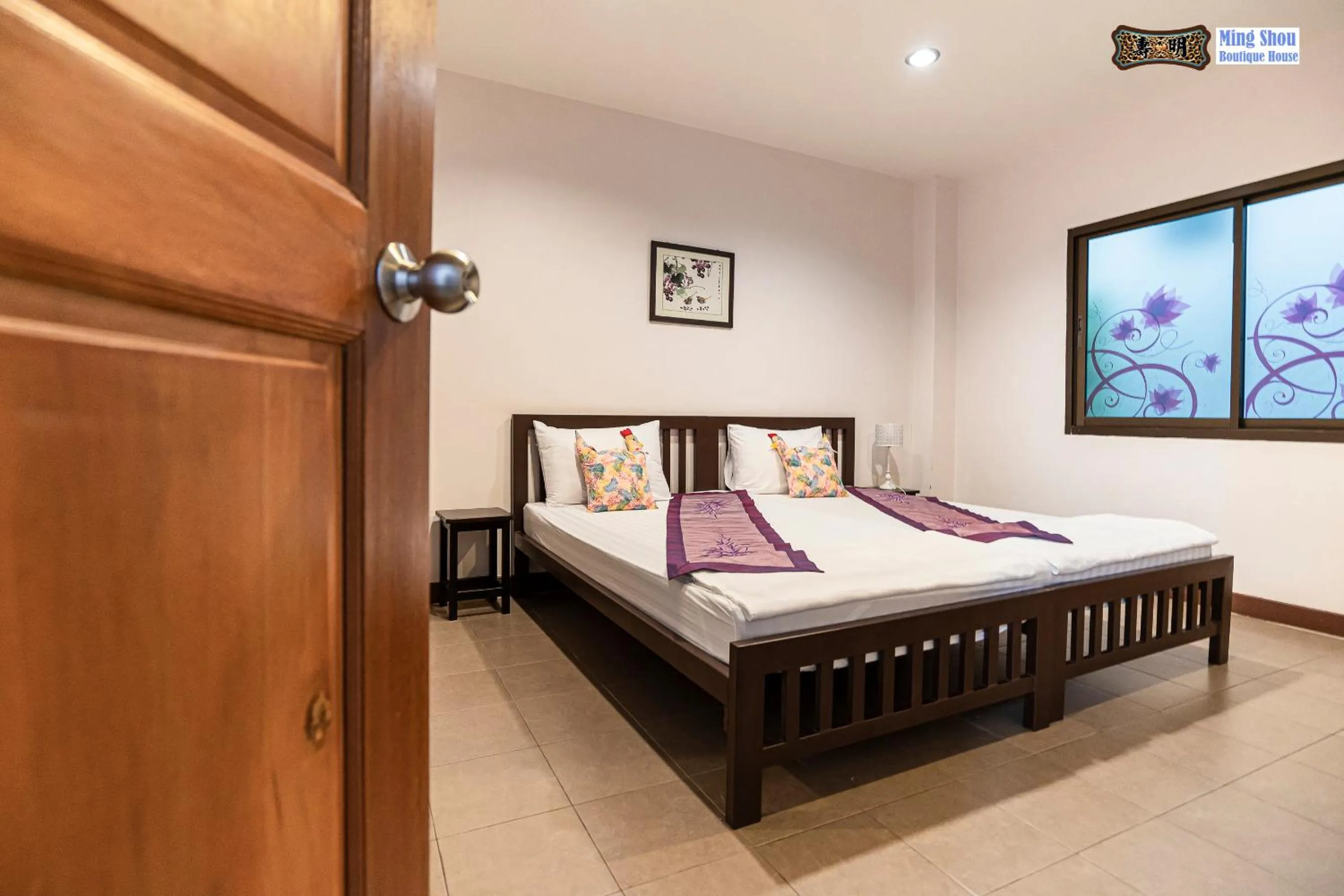 Bed in Ming Shou Boutique House