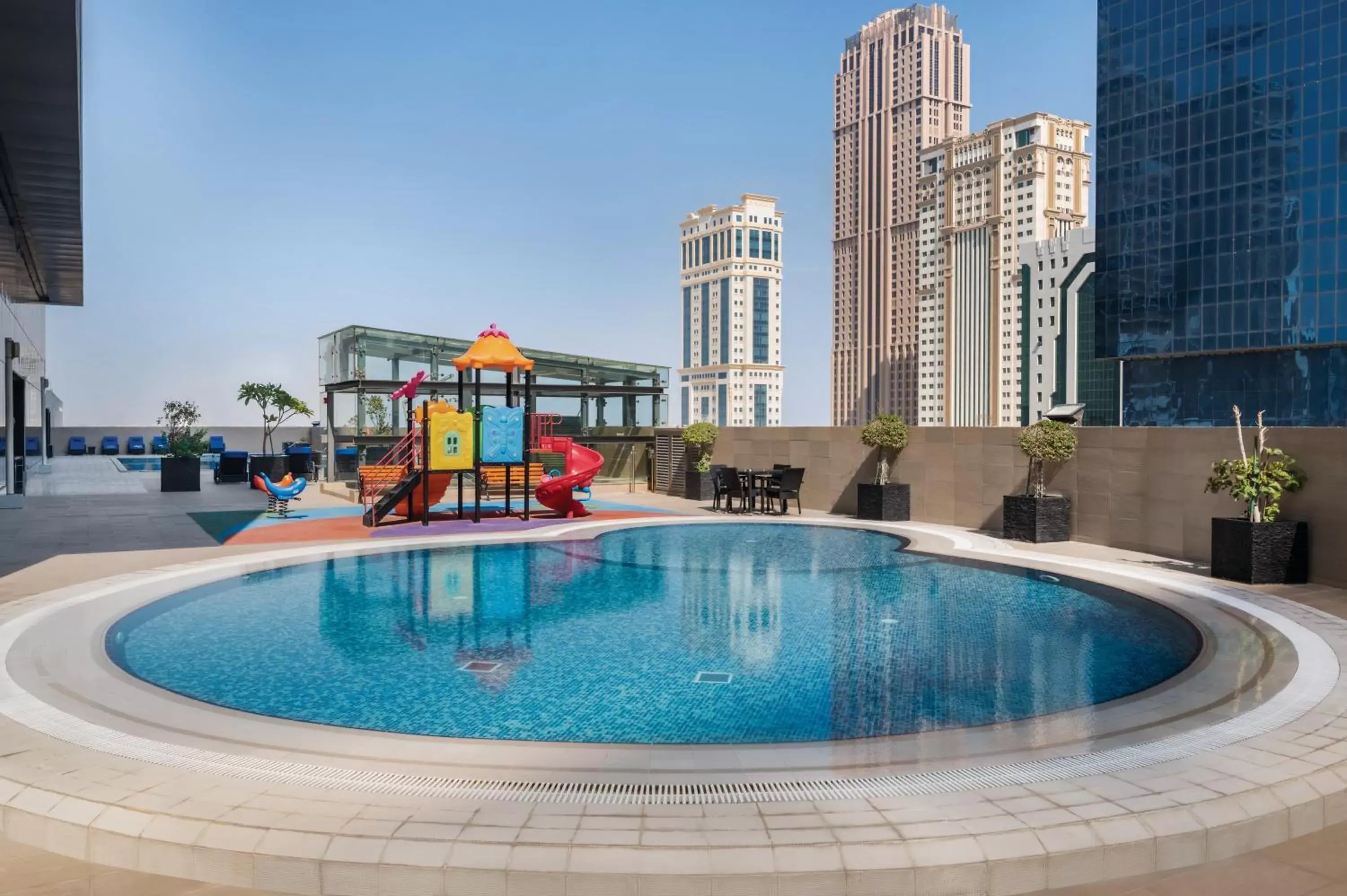 Children play ground, Swimming Pool in Wyndham Doha West Bay