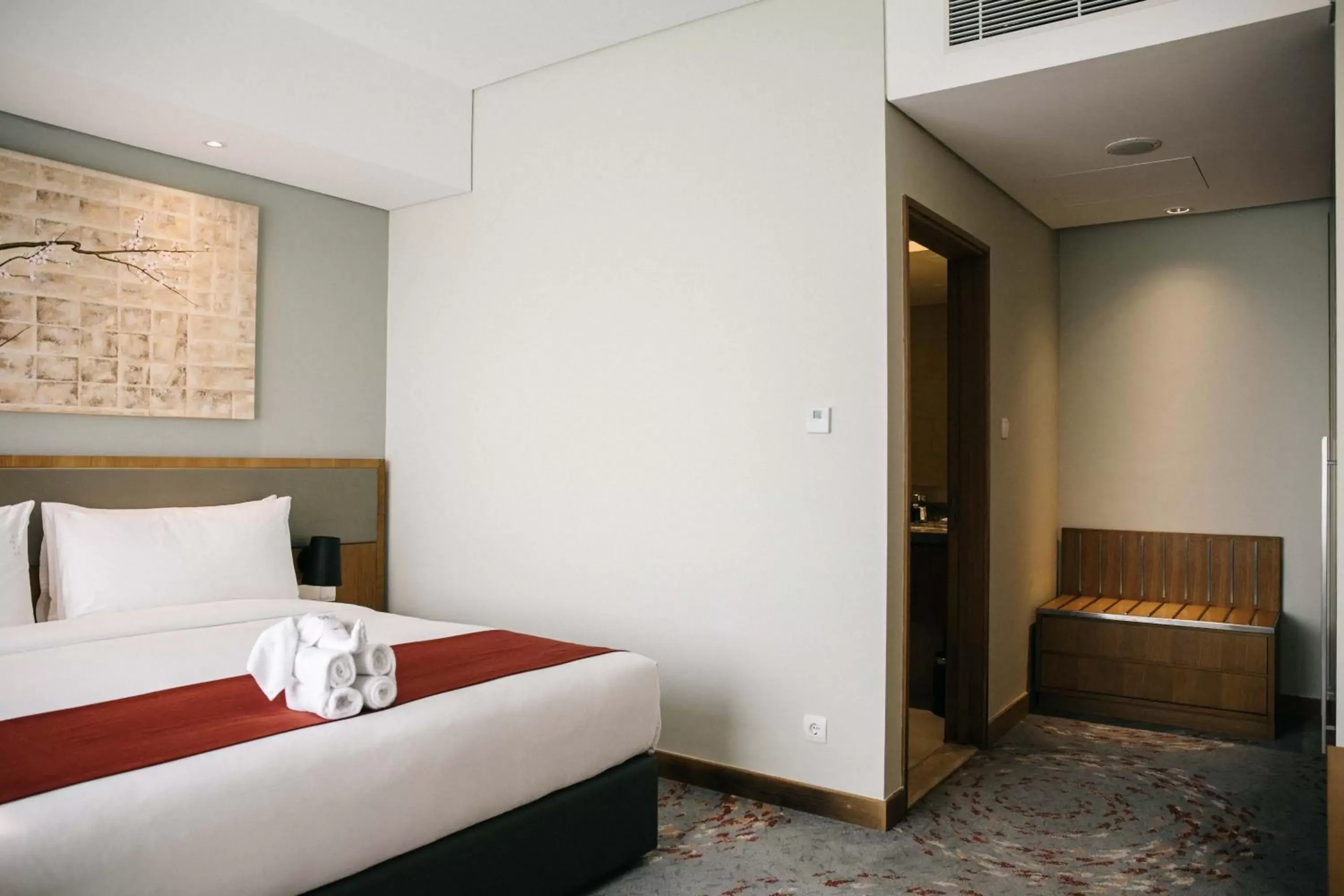 Bed in Holiday Inn & Suites Jakarta Gajah Mada by IHG Bed in Holiday Inn & Suites Jakarta Gajah Mada by IHG