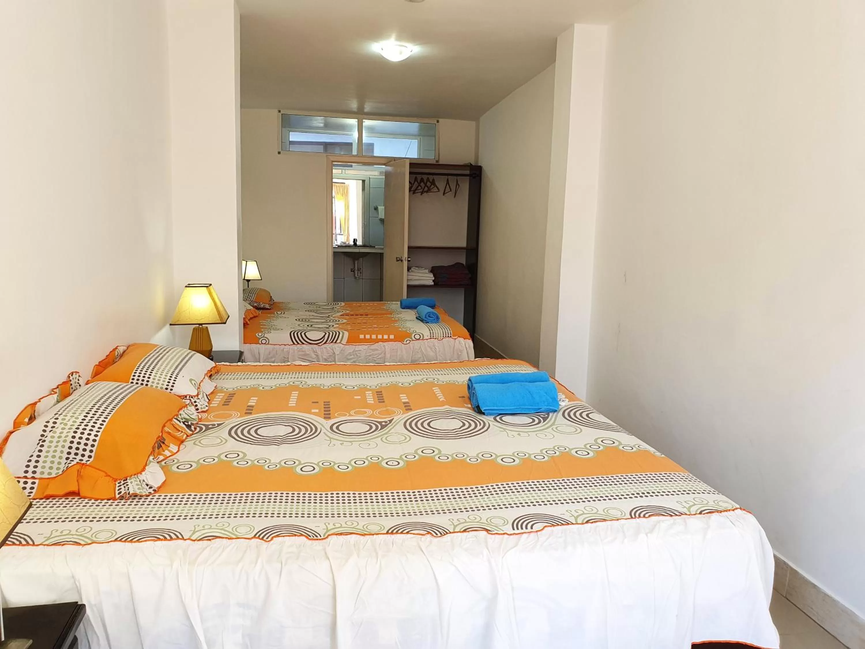 Staff, Bed in Hostal Cerro Azul